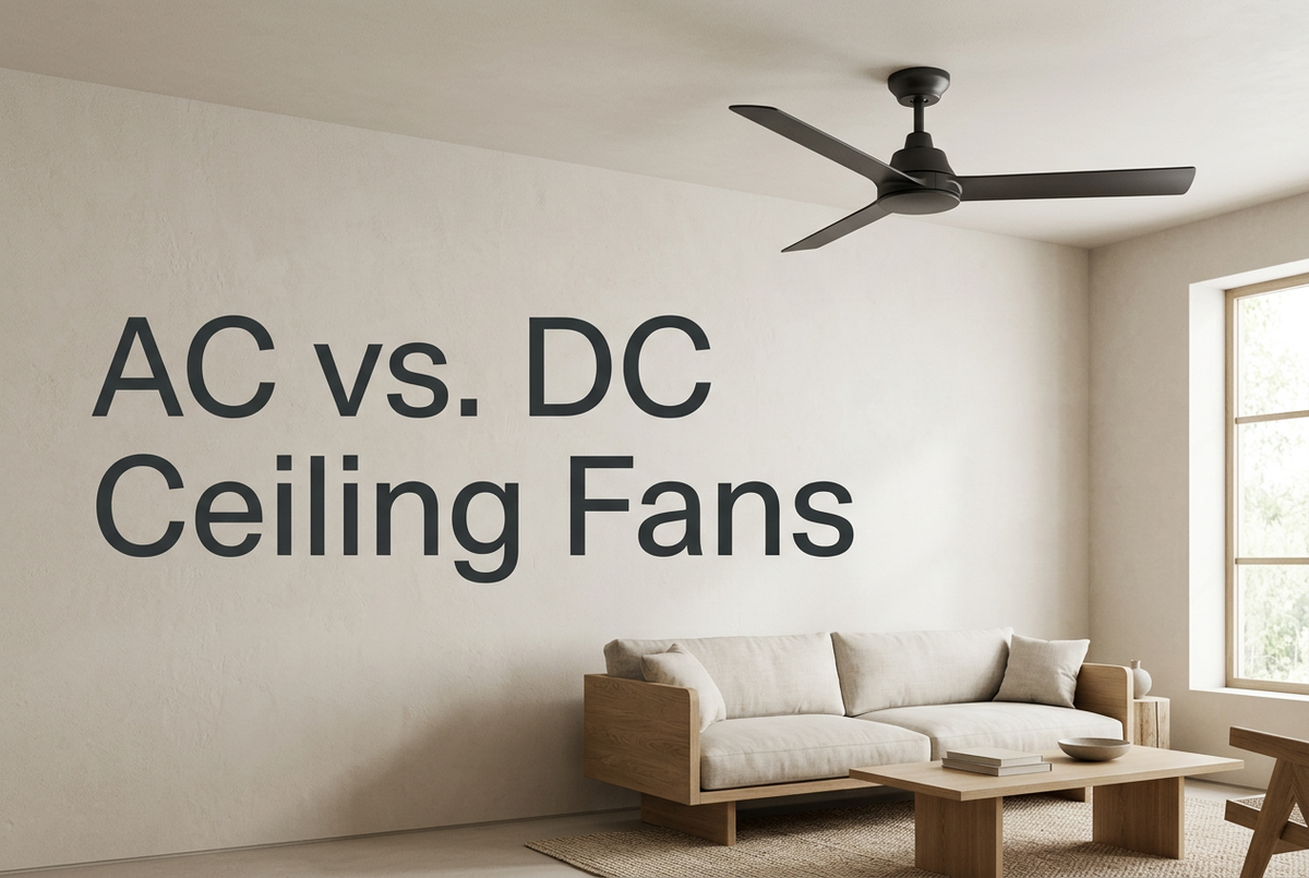 Black three-blade ceiling fan in a neutral living room with the heading ‘AC vs. DC Ceiling Fans