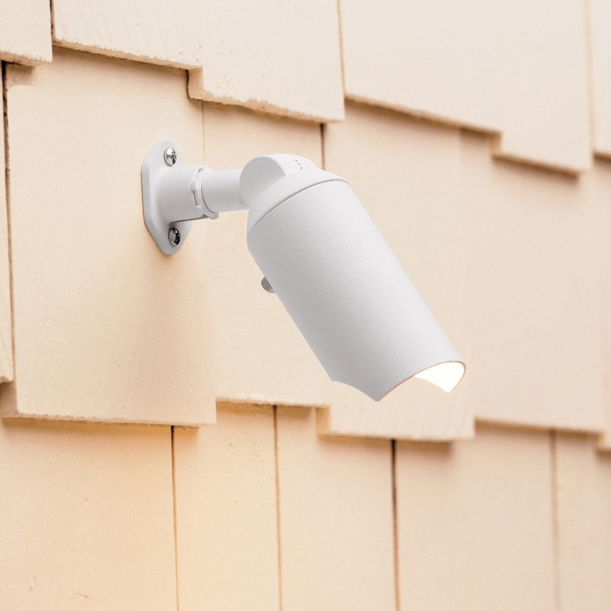 Kichler textured white 4-inch downlight with wall-mount trim and cylinder housing