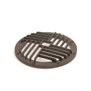 Architectural bronze circular rock guard with metal grate slats.