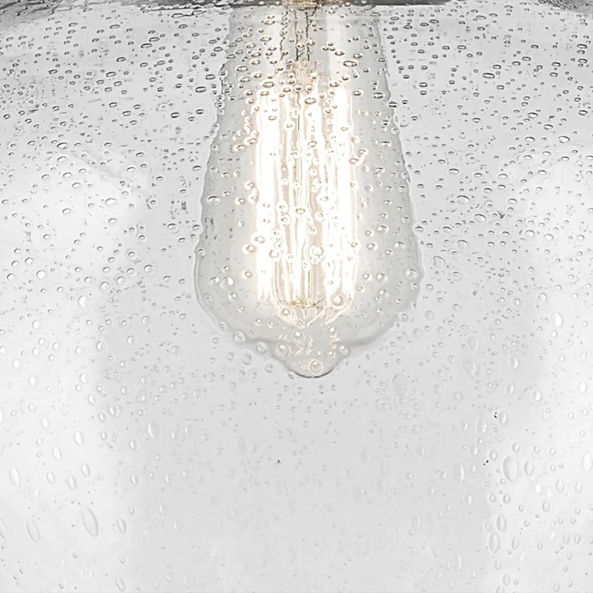Avery 15" Globe Pendant Light with Clear Seeded Glass, Black Finish - Bees Lighting