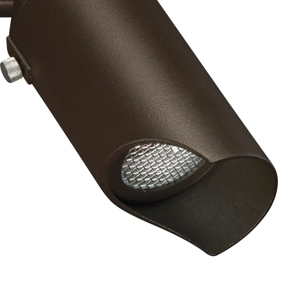 Bronze spotlight head with circular vented lens grille and rounded rim