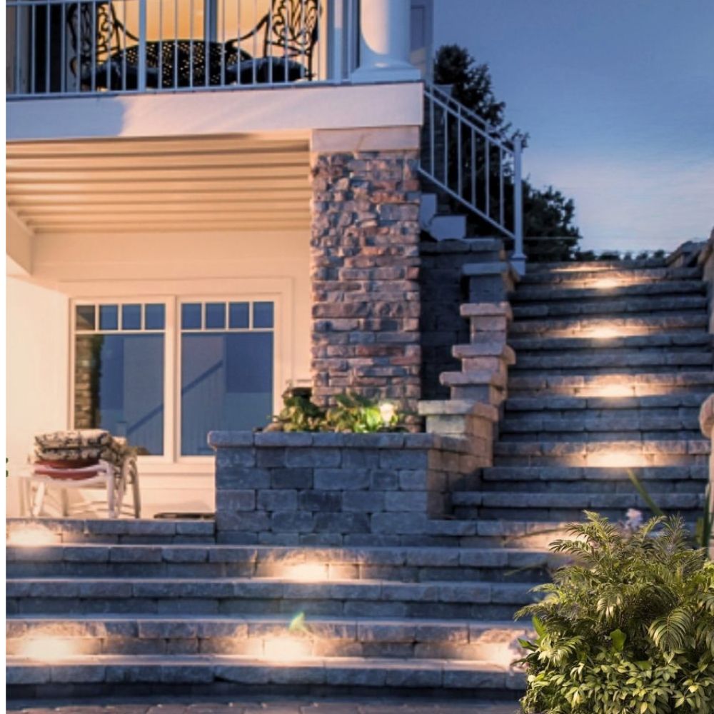 Hardscape LED lights illuminating stone steps along a walkway
