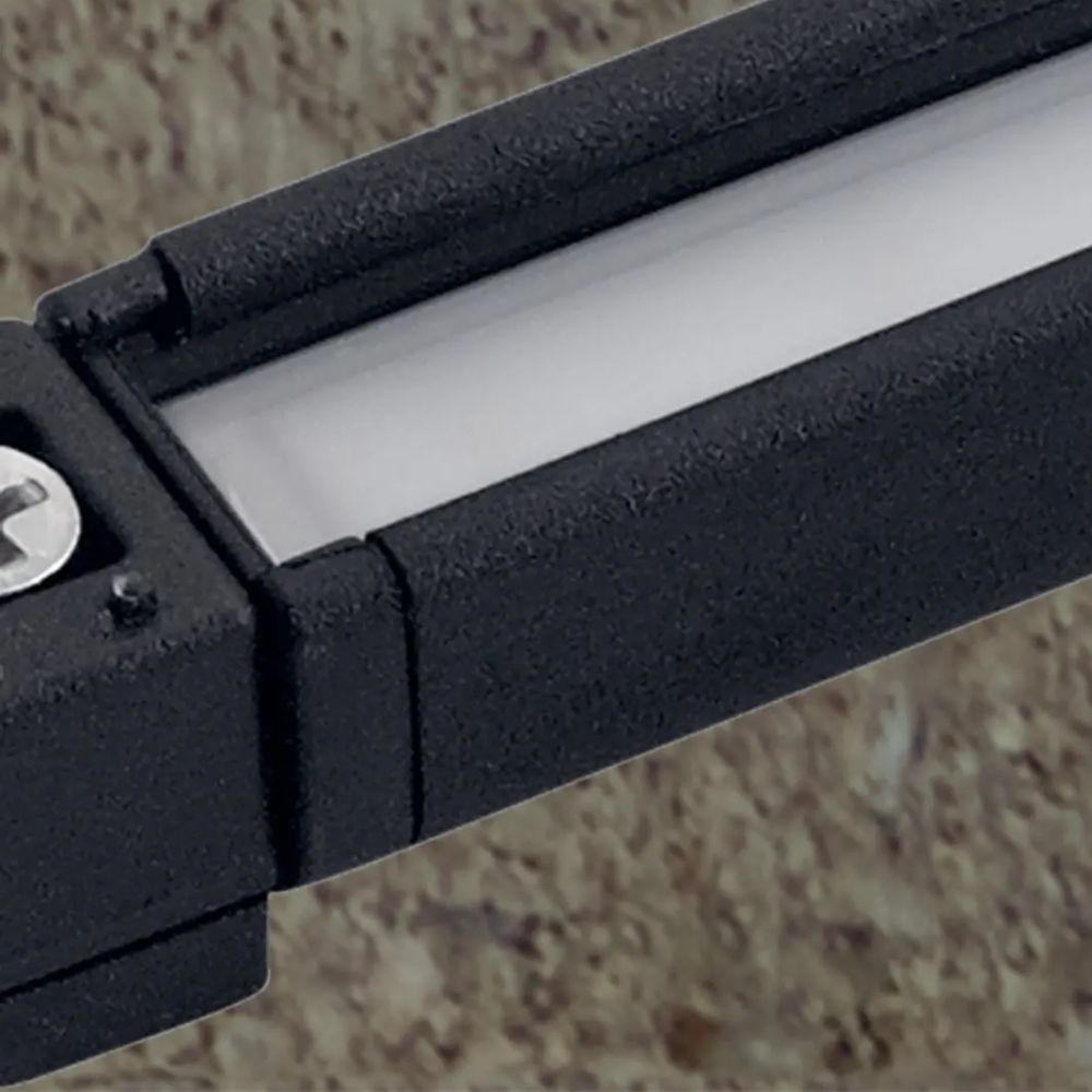 Close-up of textured black LED hardscape light housing with mounting end section
