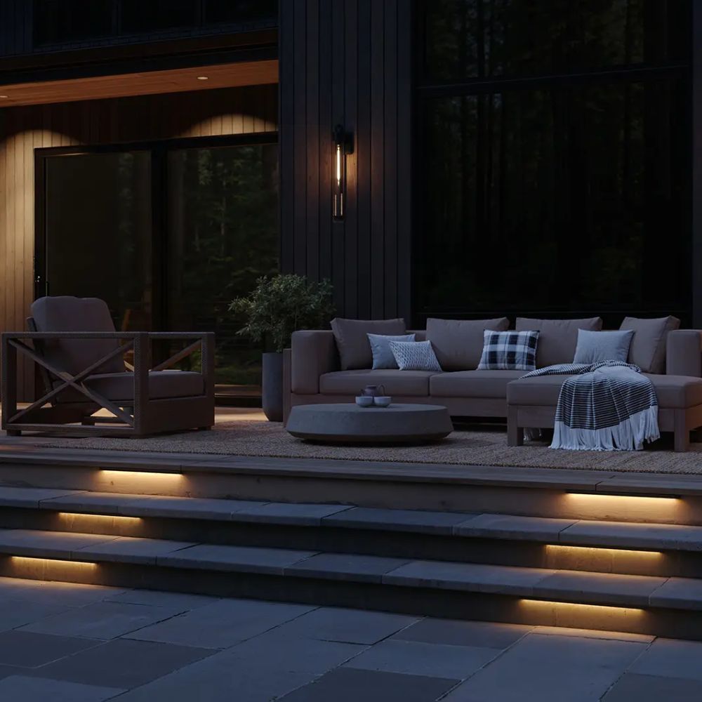Hardscape LED light strip with warm glow under an outdoor seating platform