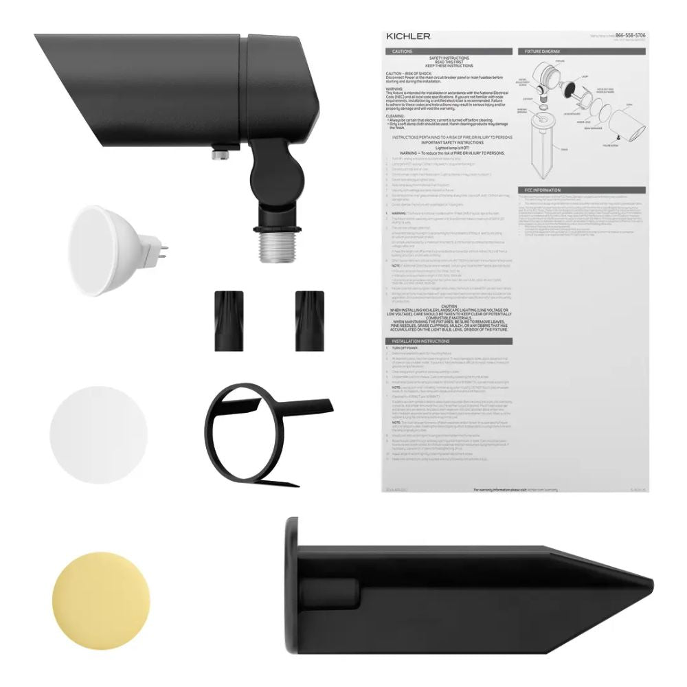 Black landscape LED accent light kit with mounting parts and instruction sheet