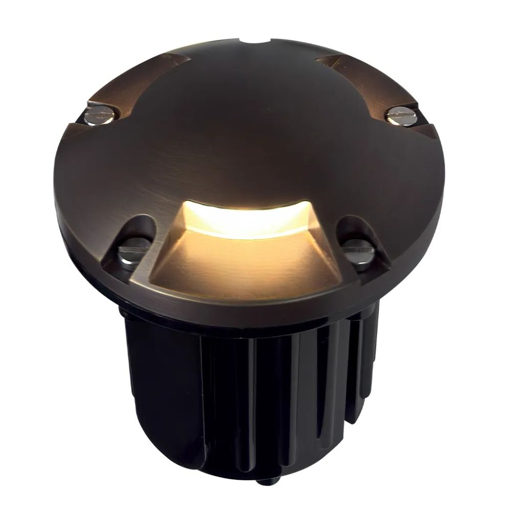 LED well light emitting warm light from the brass top, with black ribbed sides