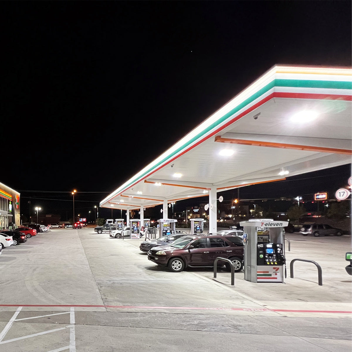 Installed LSI SCVX canopy lights under a gas station canopy for bright illumination