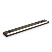 Bronze undercabinet LED light bar with two integrated outlets and control panel.