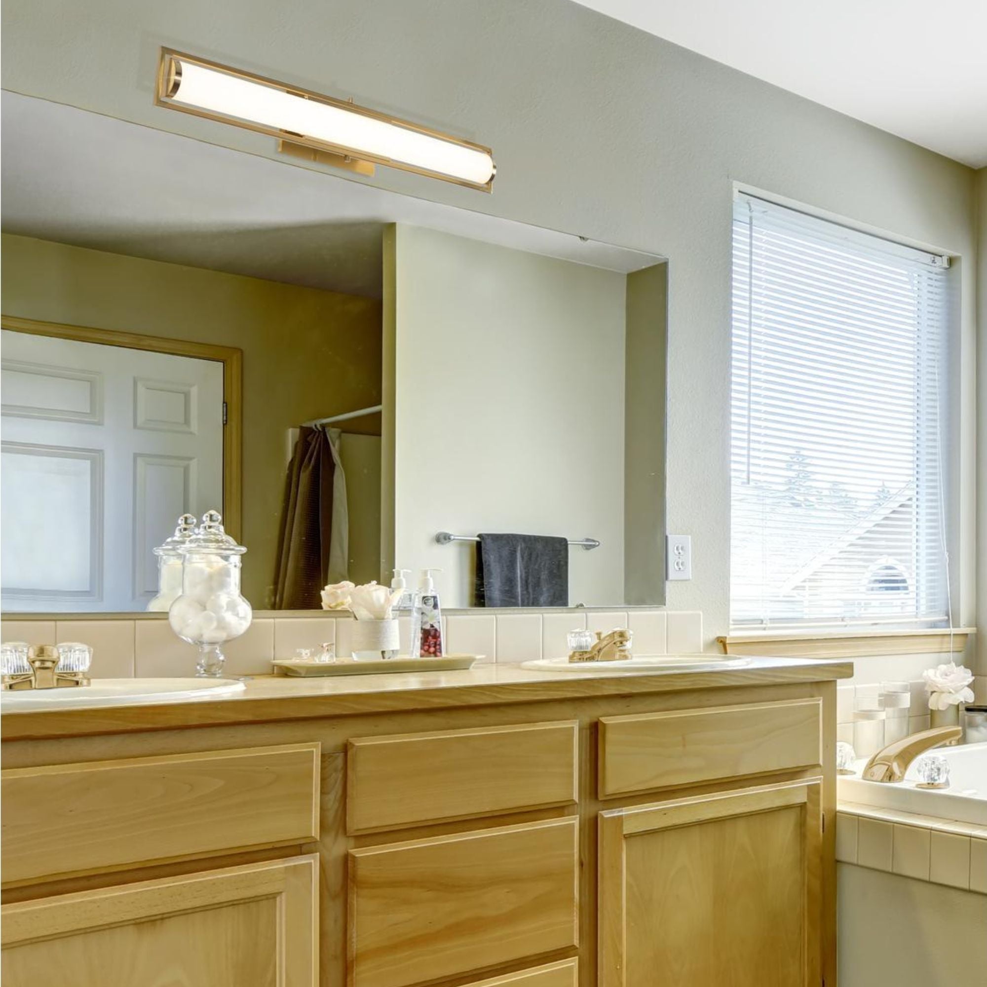Jordan 24'' LED Bath Bar, Light Antique Brass Finish - Bees Lighting