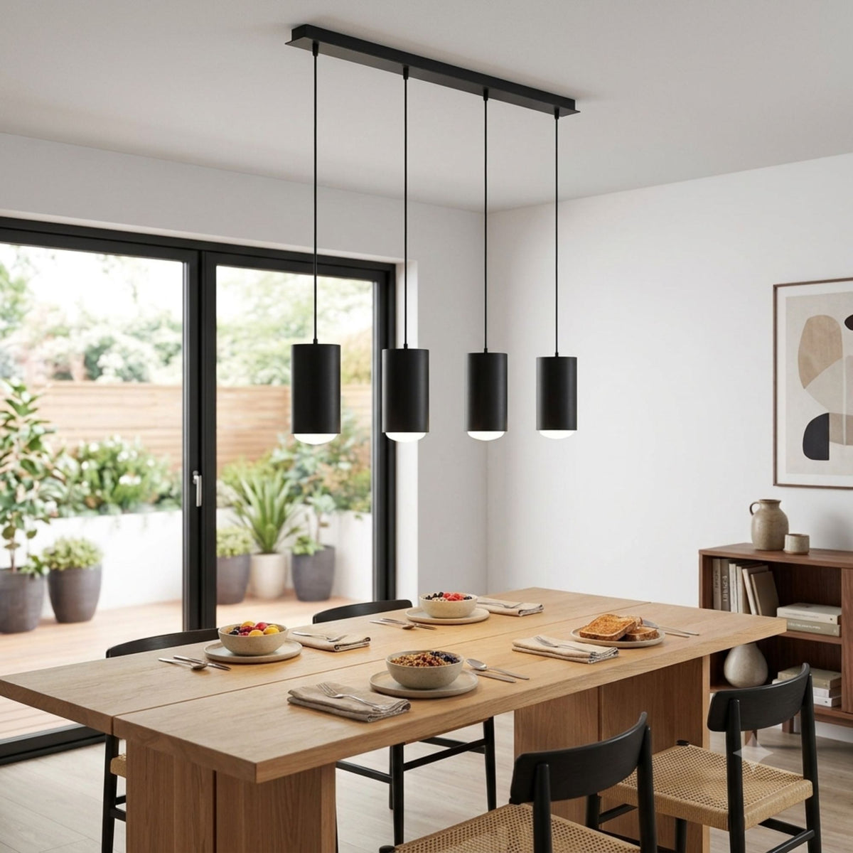 Black 4-light linear pendant with four hanging drum shades and black ceiling bar
