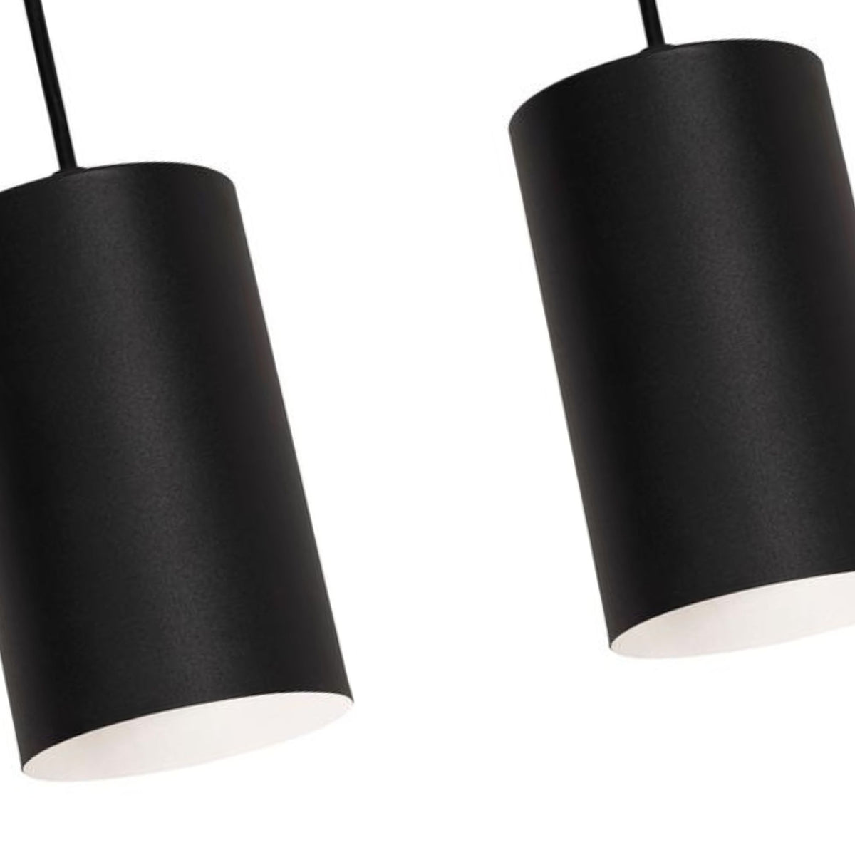 Black drum pendant shades with white interiors, close-up view of two lights