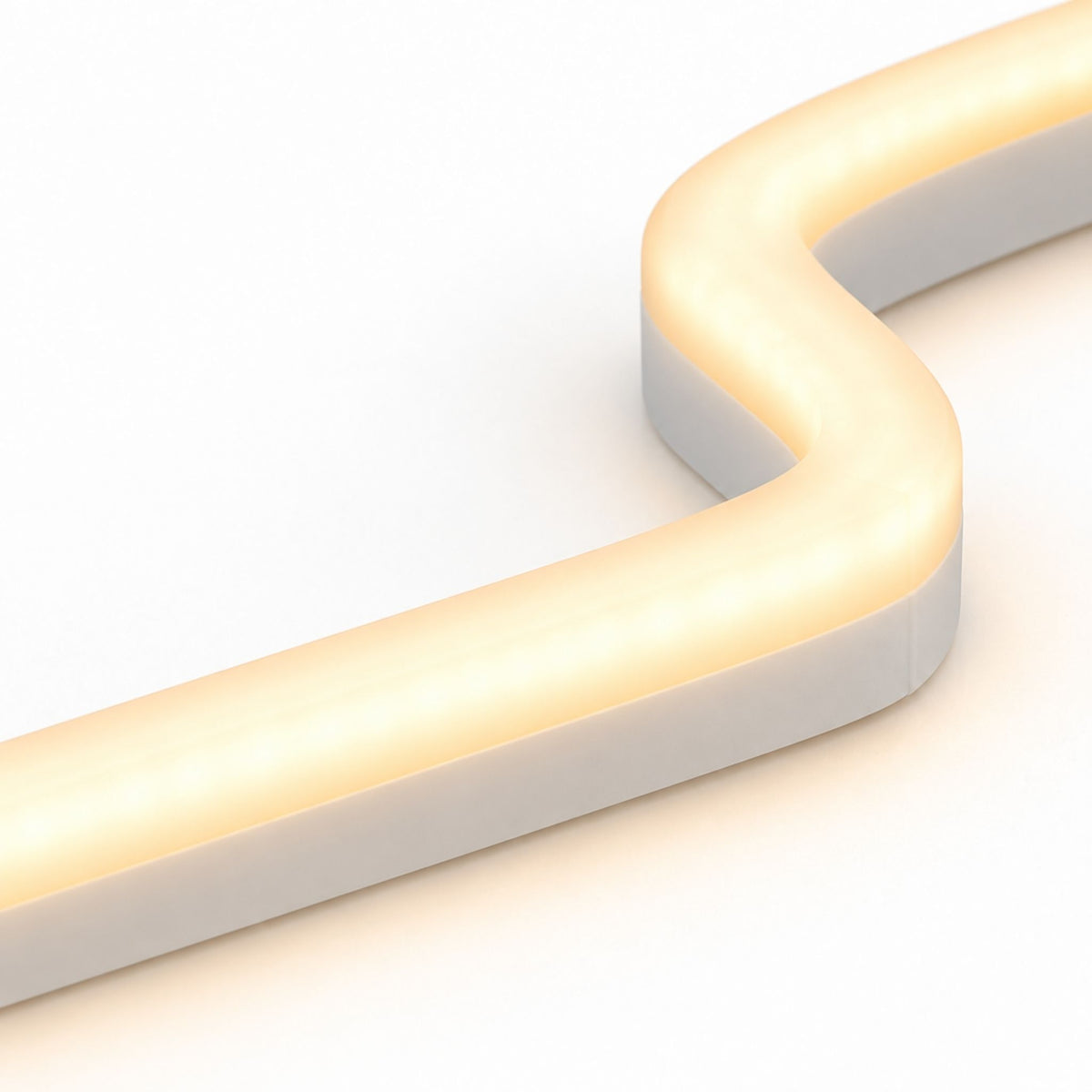Close-up of warm white top-bend LED neon strip with curved gray channel housing