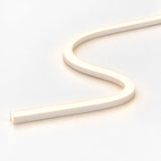 White top-bend LED neon strip with warm glow, bent into a corner shape