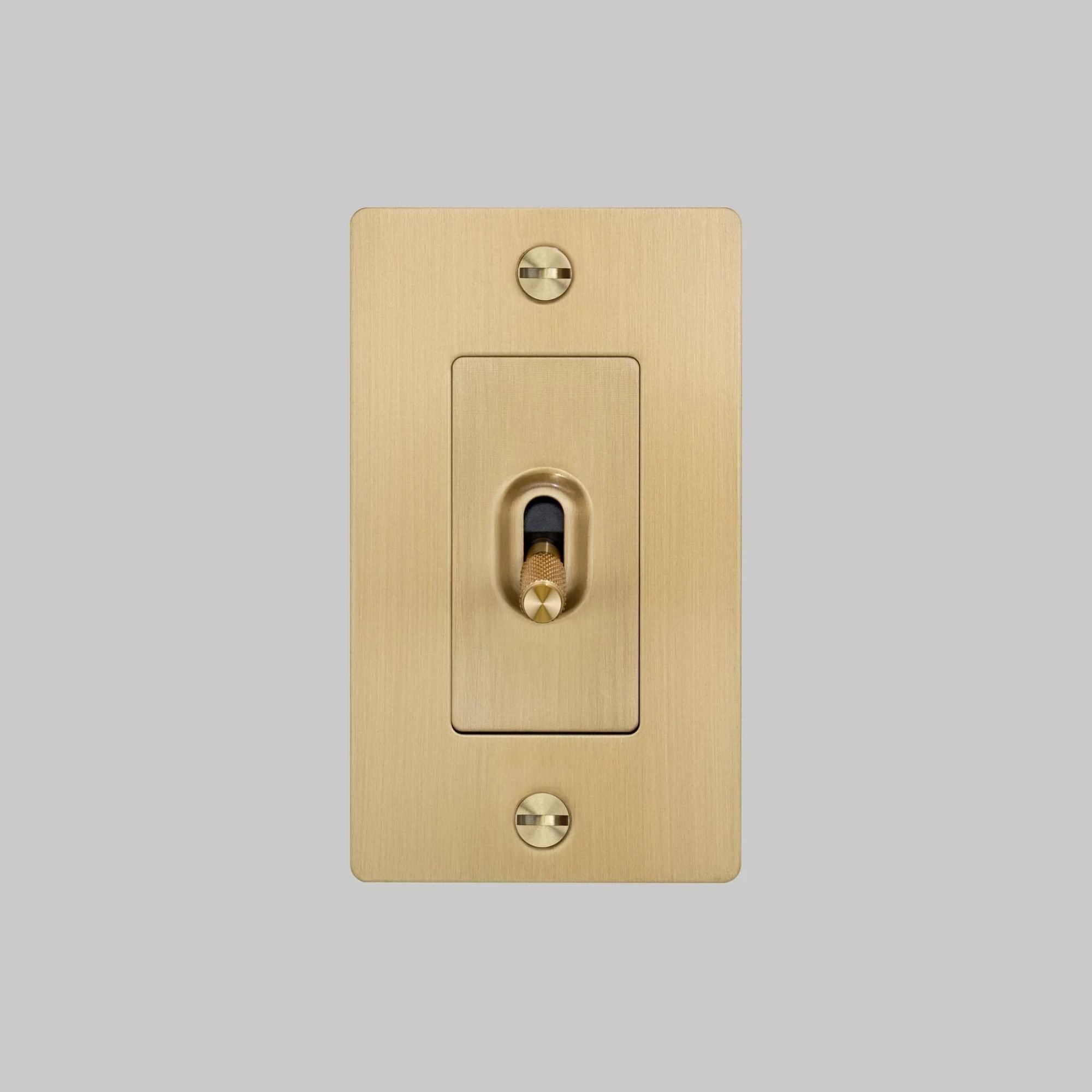 Buster + Punch NTG-053817 Cross 1-Gang Toggle Switch Without Logo, 15A, Single Pole/3-Way, Brass