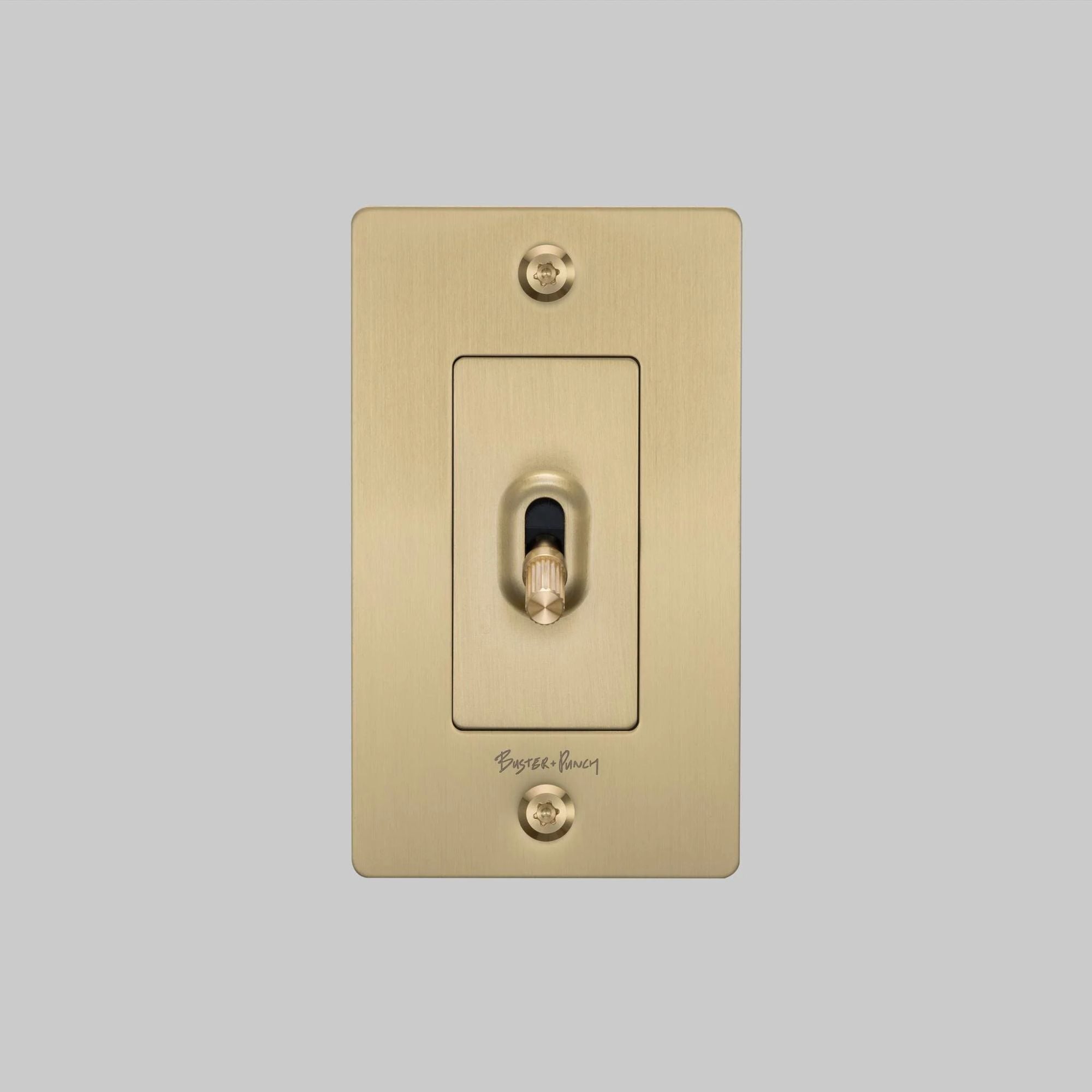 Buster + Punch NTG-054031 Linear 1-Gang Toggle Switch With Logo, 15A, Single Pole/3-Way, Brass