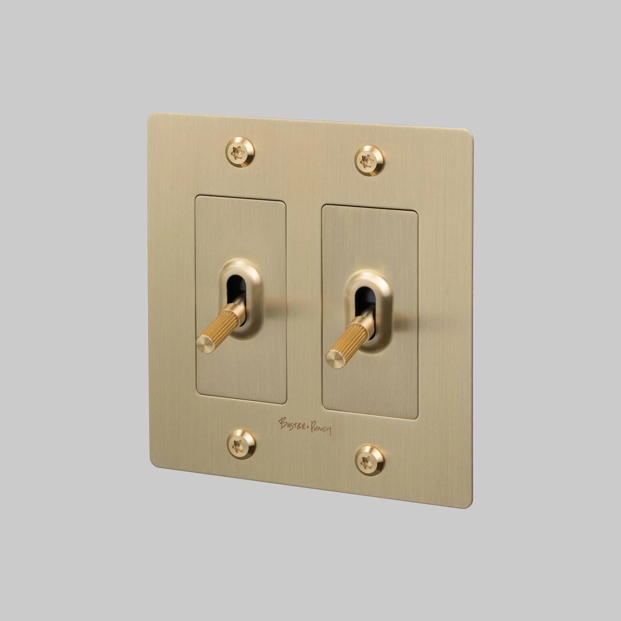 Buster + Punch NTG-054042 Linear 2-Gang Toggle Switch With Logo, 15A, Single Pole/3-Way, Brass