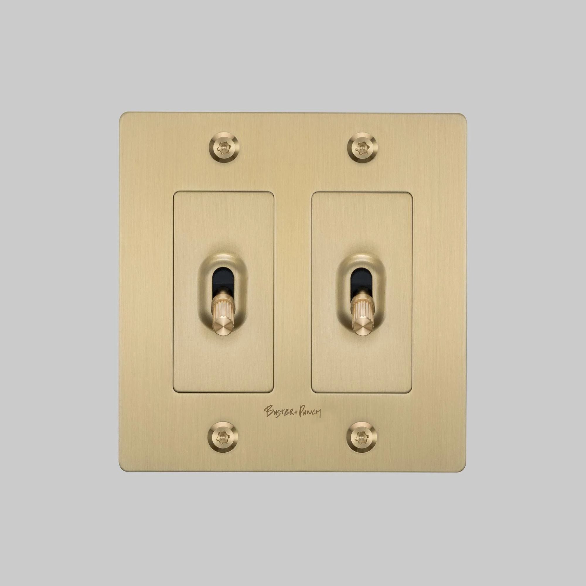 Buster + Punch NTG-054042 Linear 2-Gang Toggle Switch With Logo, 15A, Single Pole/3-Way, Brass