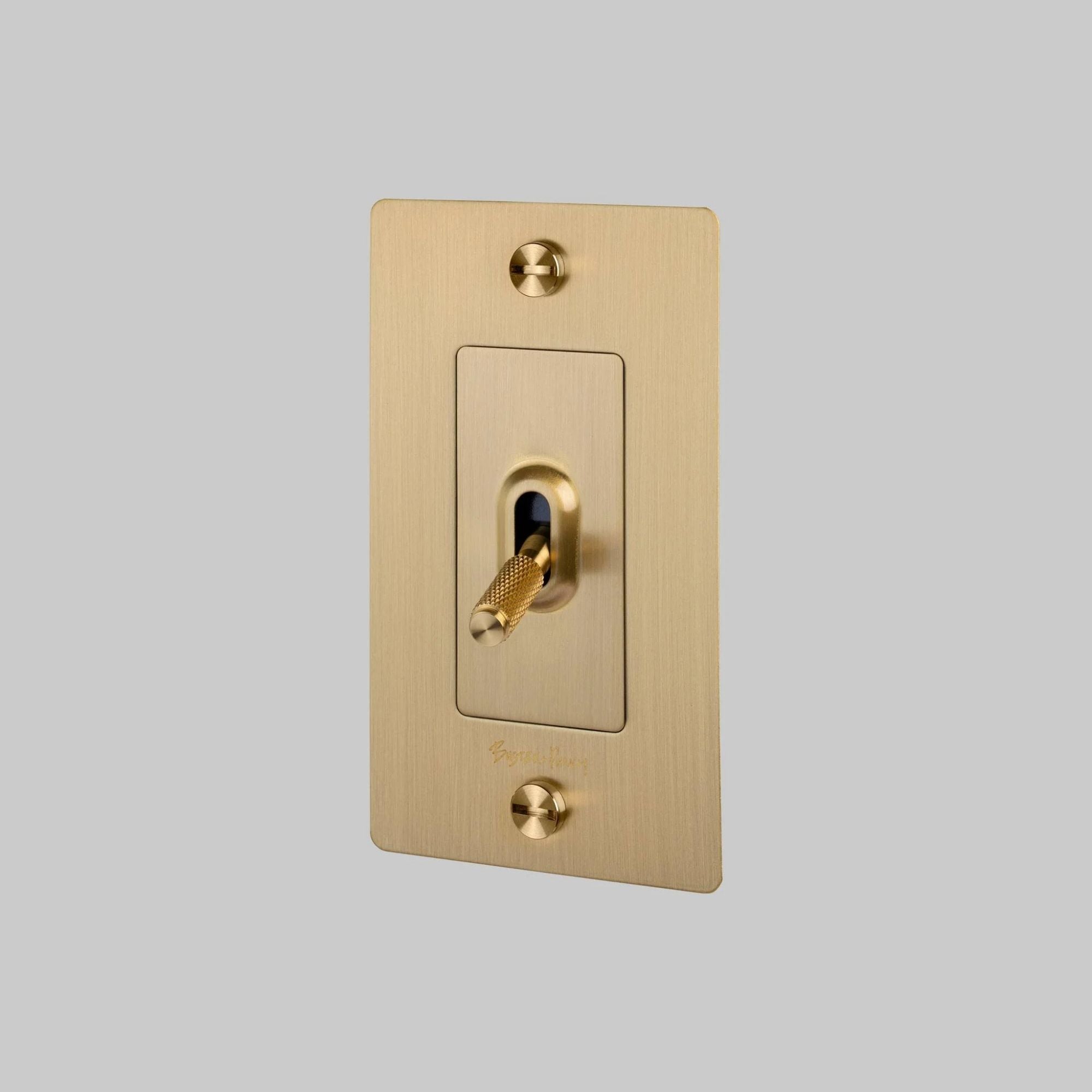Buster + Punch NTK-053424 Cross 1-Gang Toggle Switch With Logo, 15A, Single Pole/3-Way, Brass