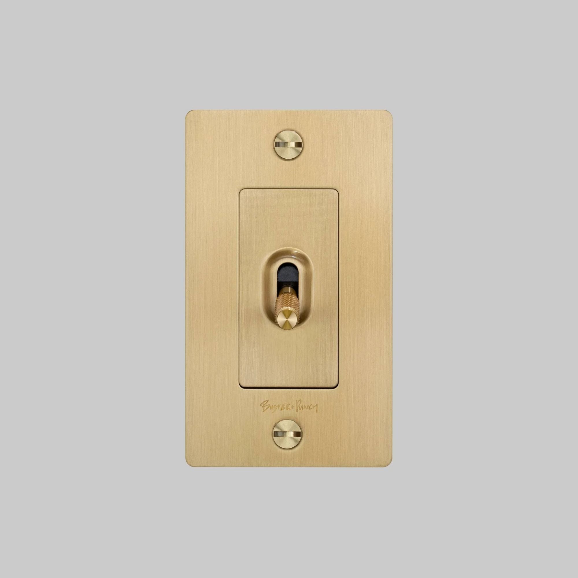 Buster + Punch NTK-053424 Cross 1-Gang Toggle Switch With Logo, 15A, Single Pole/3-Way, Brass