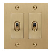 Buster + Punch NTK-053429 Cross 2-Gang Toggle Switch With Logo, 15A, Single Pole/3-Way, Brass