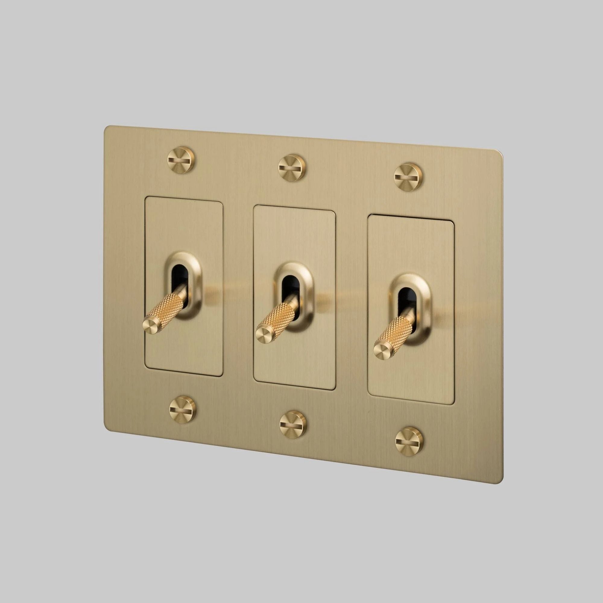 Buster + Punch NTK-054387 Cross 3-Gang Toggle Switch Without Logo, 15A, Single Pole/3-Way, Brass