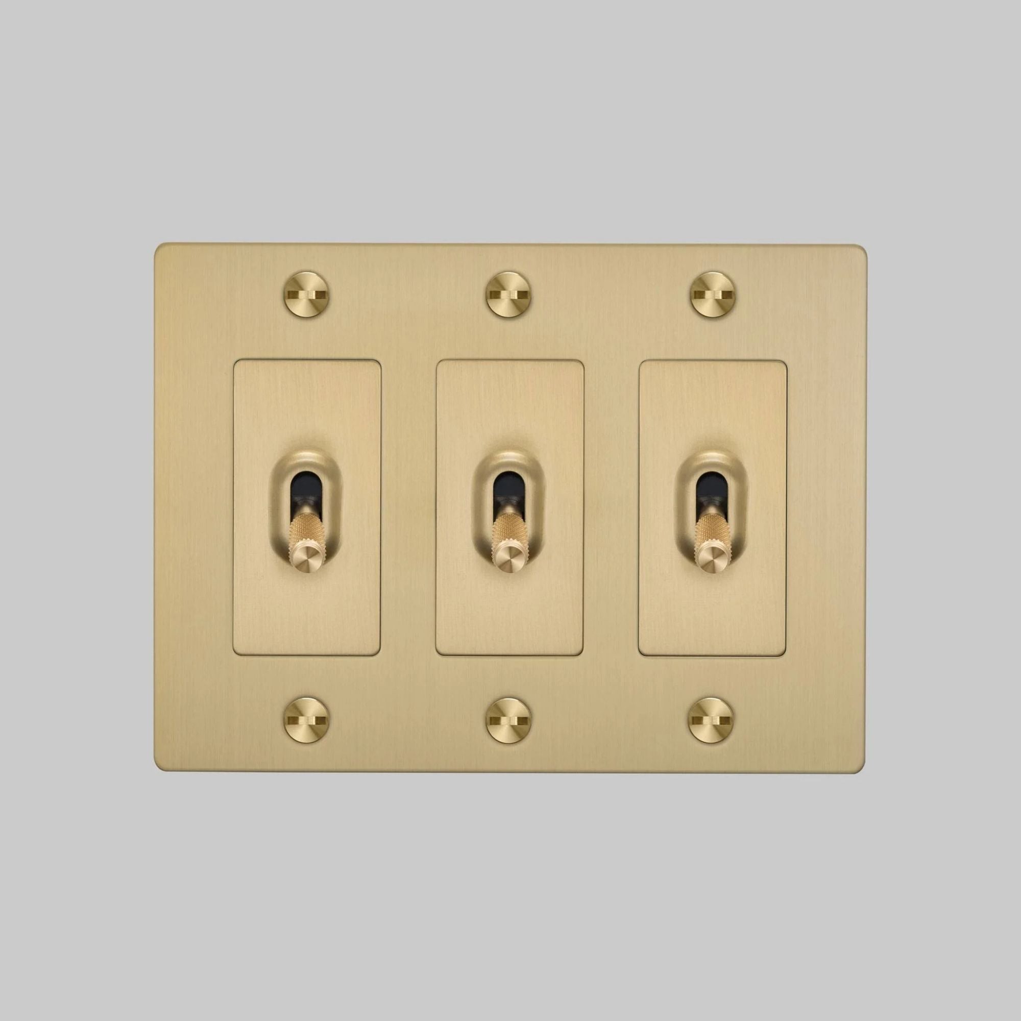 Buster + Punch NTK-054387 Cross 3-Gang Toggle Switch Without Logo, 15A, Single Pole/3-Way, Brass