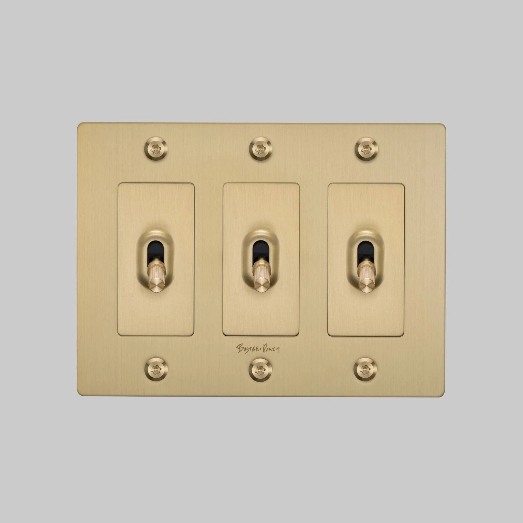 Buster + Punch NTK-054392 Linear 3-Gang Toggle Switch With Logo, 15A, Single Pole/3-Way, Brass