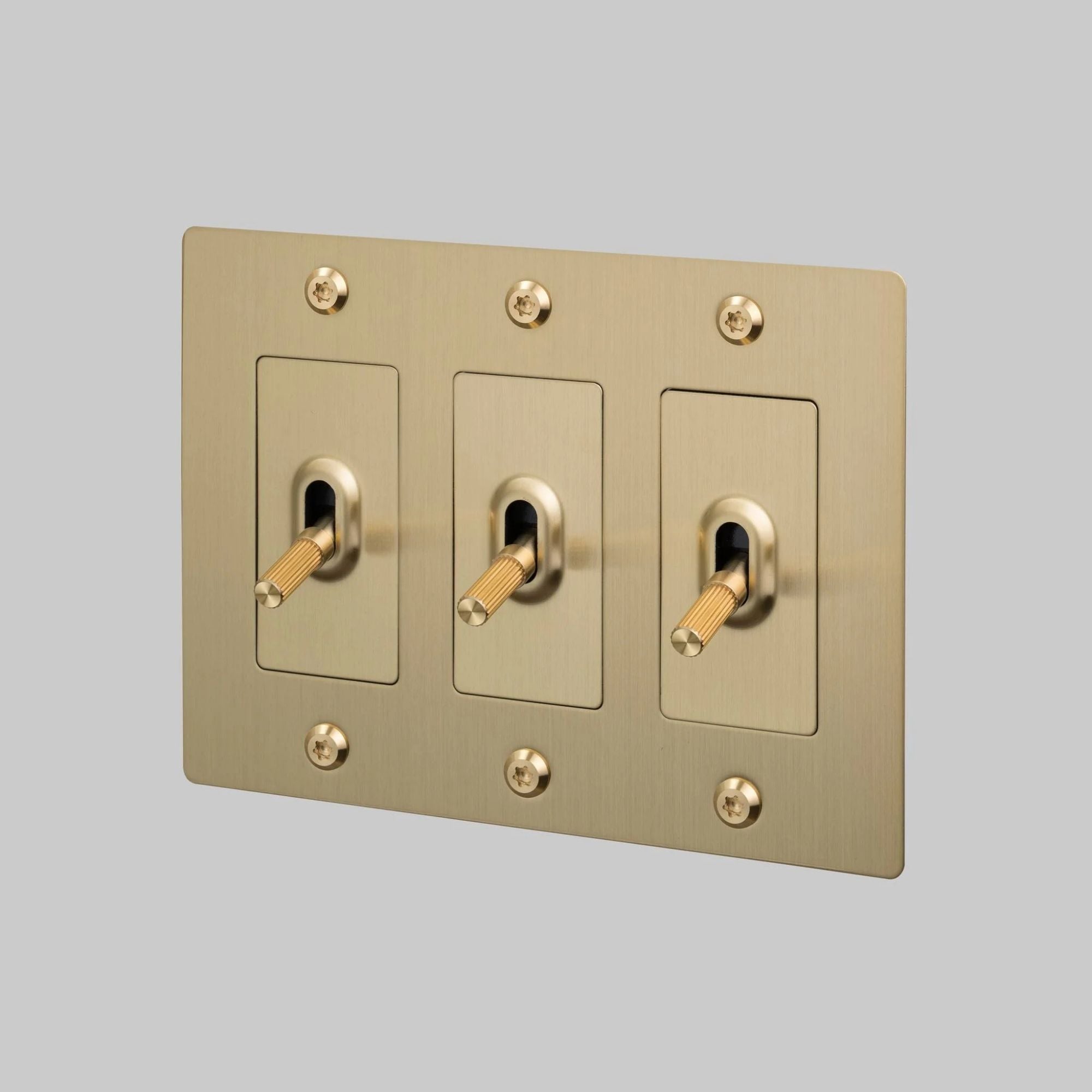 Buster + Punch NTK-054397 Linear 3-Gang Toggle Switch Without Logo, 15A, Single Pole/3-Way, Brass