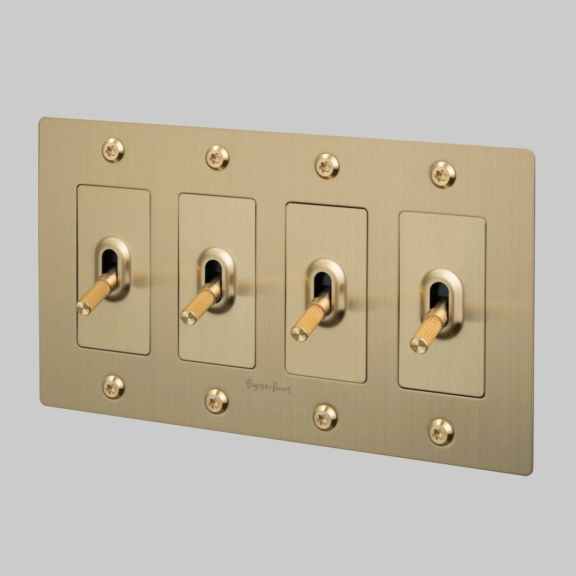 Buster + Punch NTK-054412 Linear 4-Gang Toggle Switch With Logo, 15A, Single Pole/3-Way, Brass