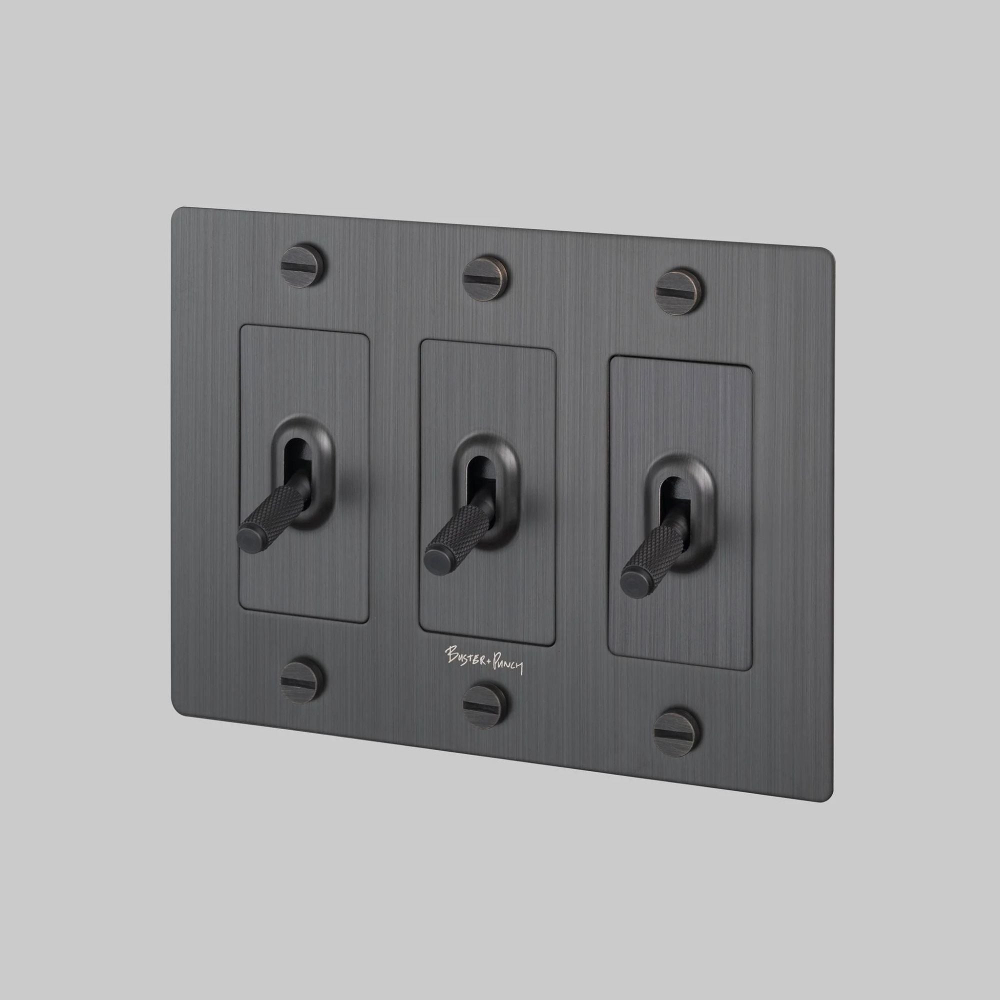 Buster + Punch NTK-094383 Cross 3-Gang Toggle Switch With Logo, 15A, Single Pole/3-Way, Smoked Bronze