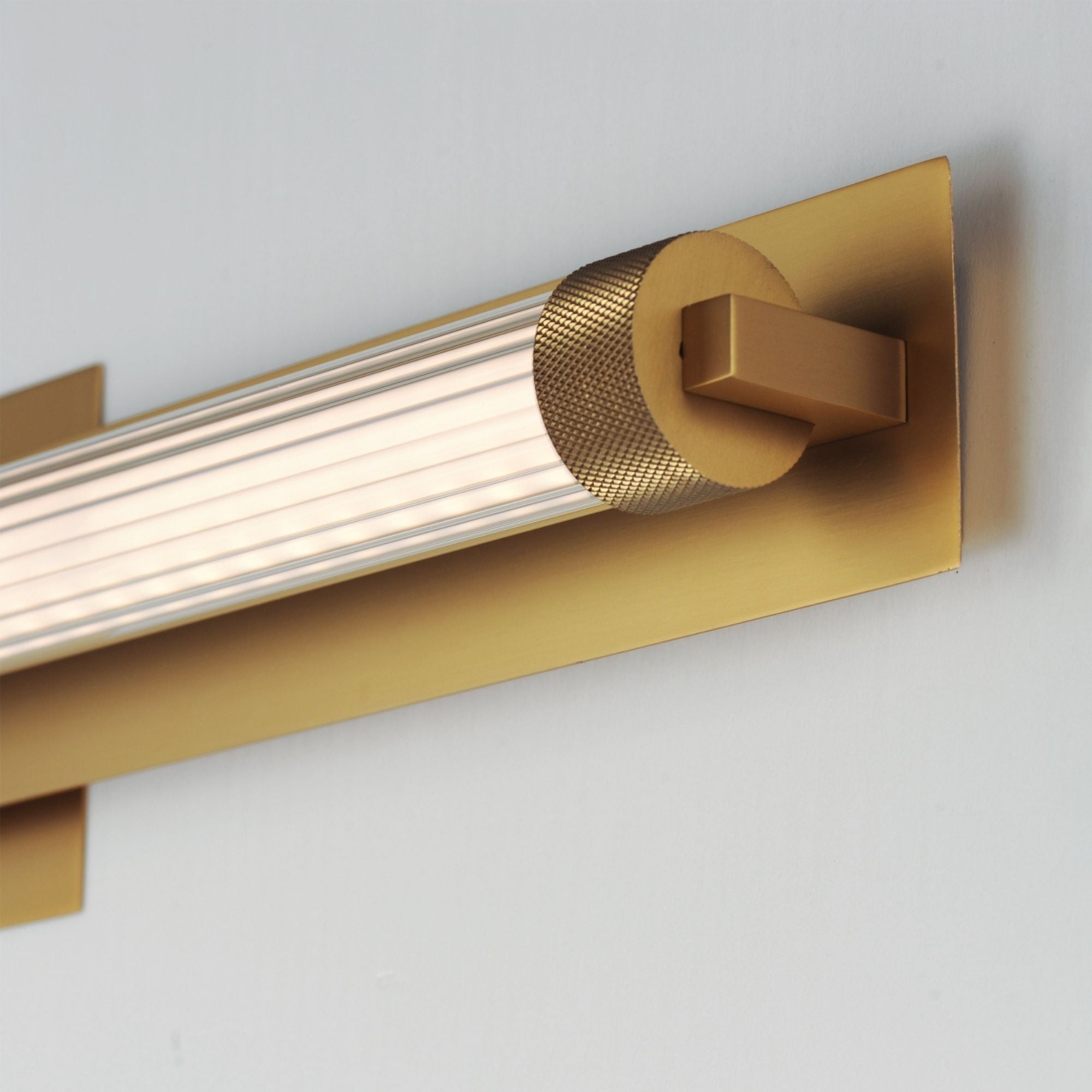 Doric 26" LED Bath Sconce, Natural Aged Brass Finish