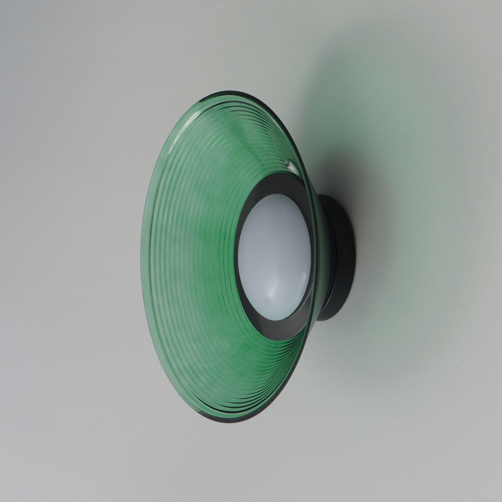 Jensen 12" LED Wall Sconce/Flush Mount, Black Finish with Green Glass