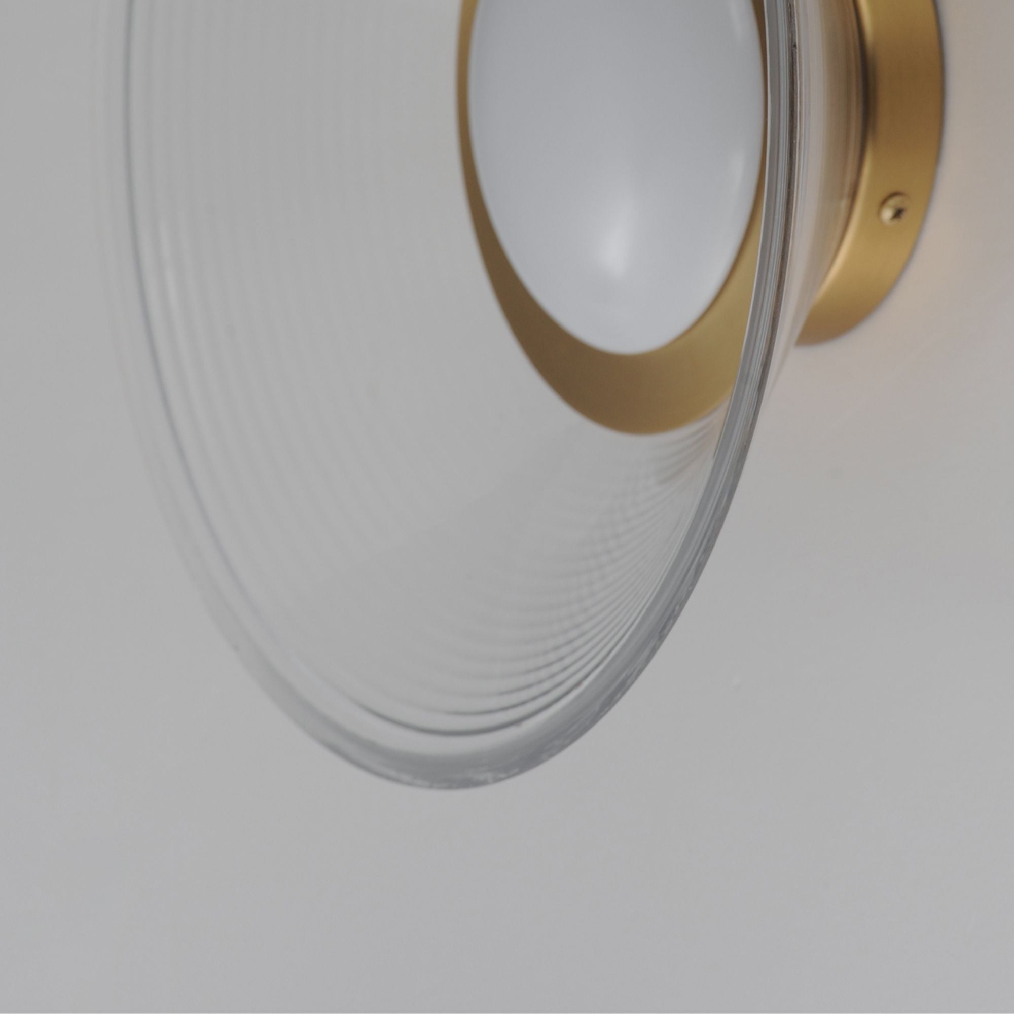 Jensen 12" LED Wall Sconce/Flush Mount, Satin Brass Finish with Clear Glass