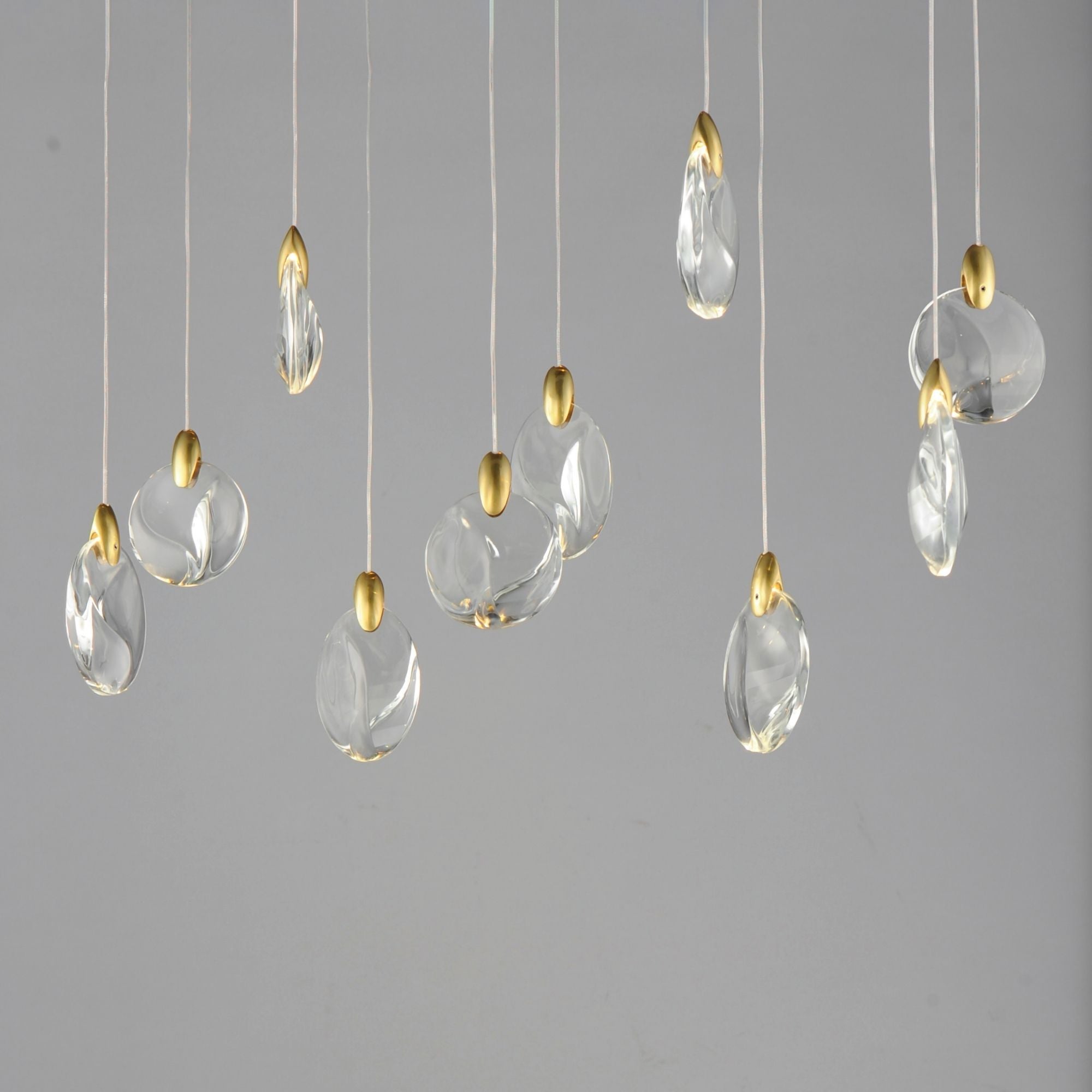 Pebble 36" LED Linear Pendant, Black & Polished Gold Finish