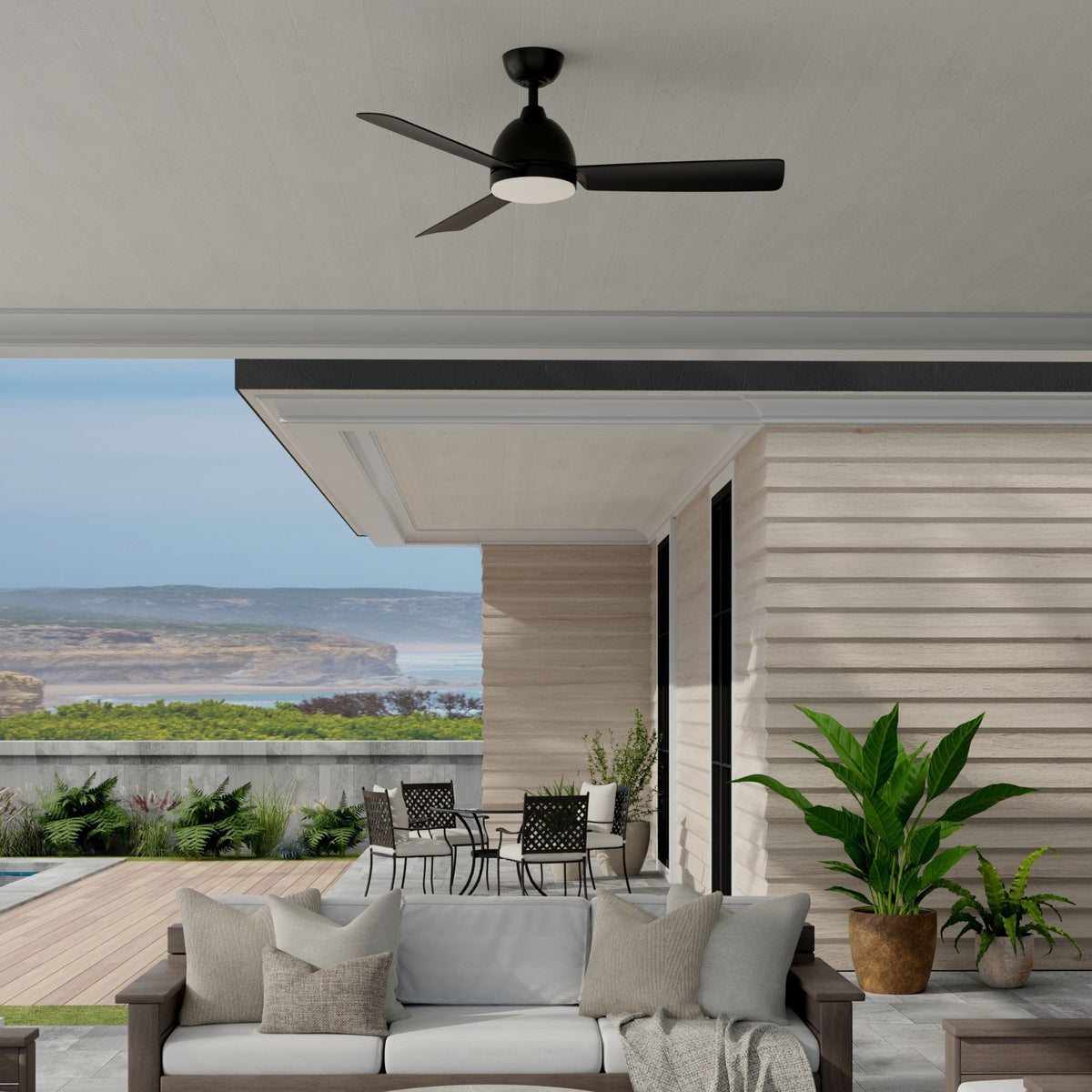 Black 52 in ceiling fan with LED light kit and four blades, mounted on ceiling