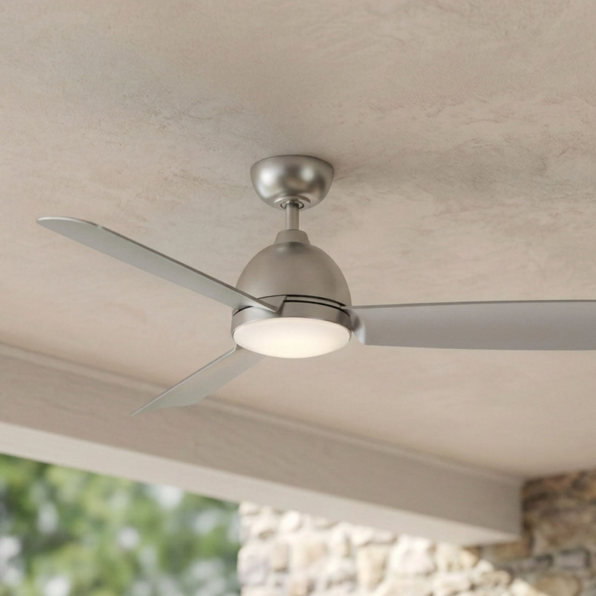 Nickel marine-grade ceiling fan with four pale blades and integrated LED light
