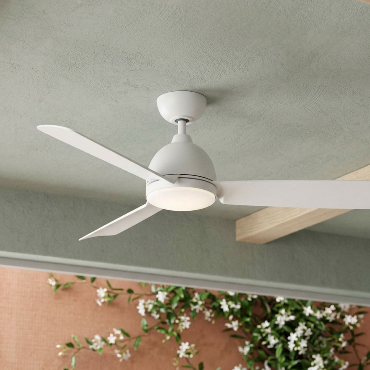 Matte white ceiling fan with lit integrated LED light and long blades