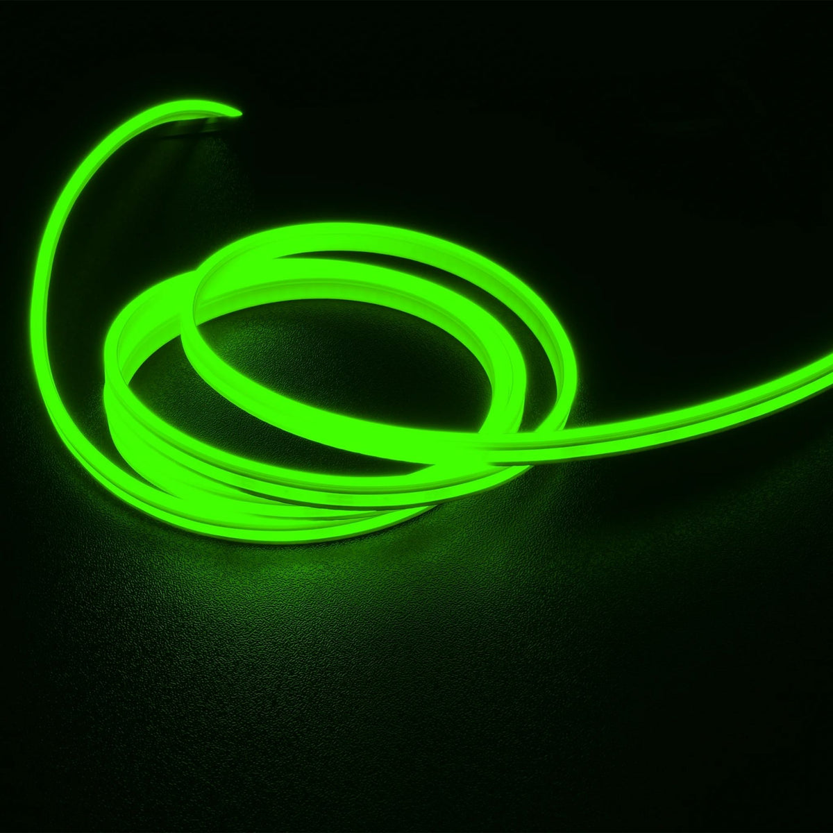 Green flexible neon-style tape light with LED strip, coiled