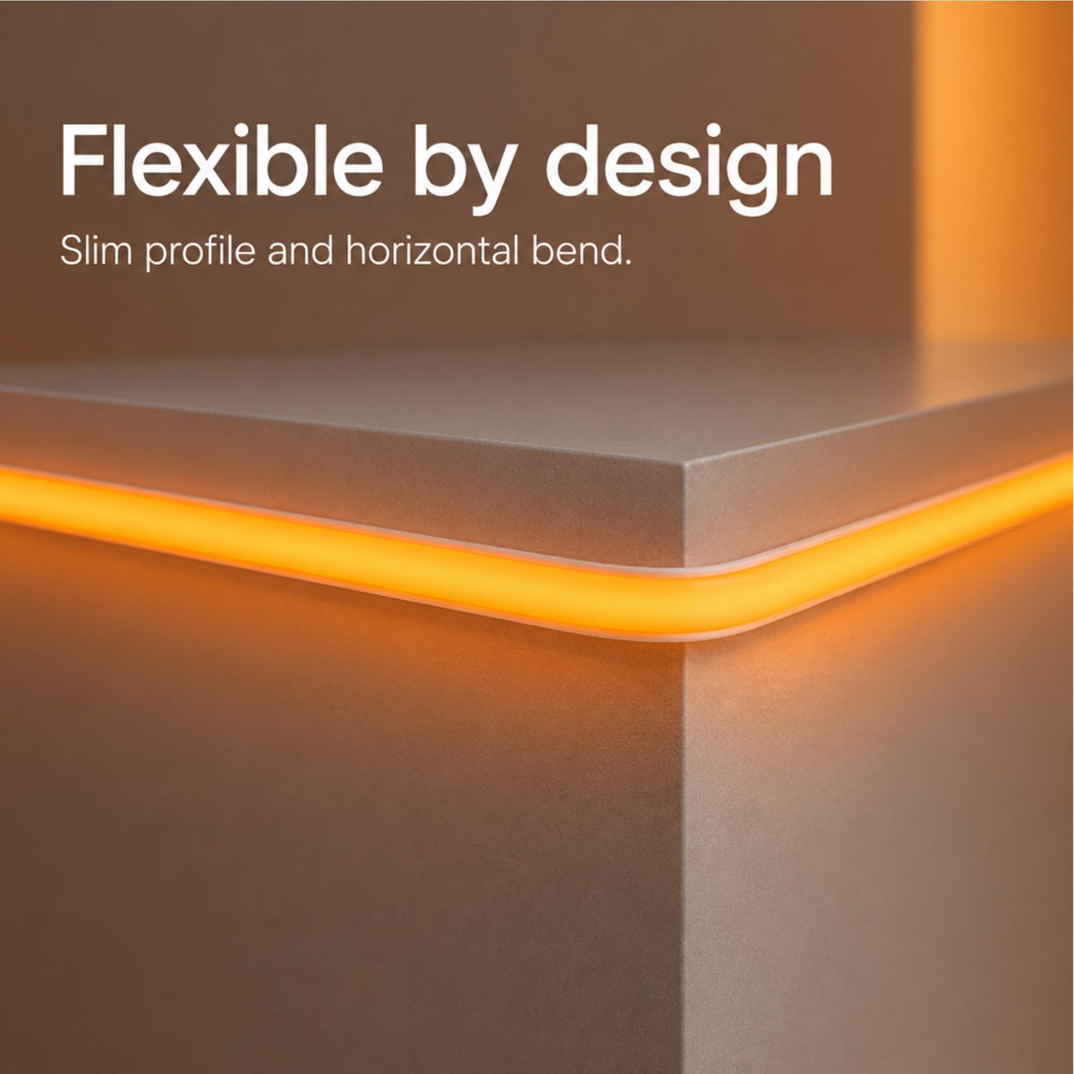 Orange LED tape light corner bend with thin diffuser profile along a surface edge