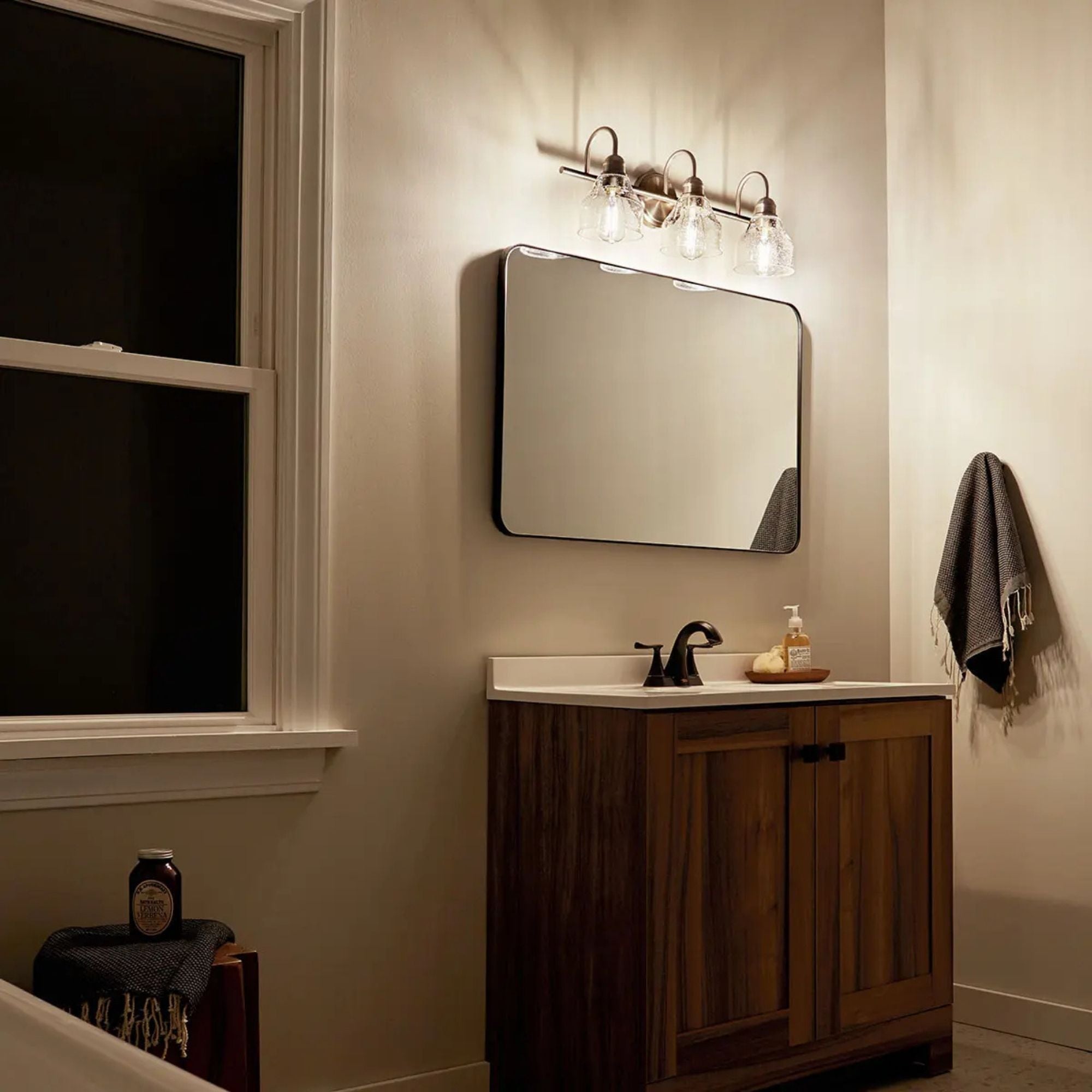 Kichler Avery 24 in. 3-Light Bathroom Vanity Light, Natural Brass with Clear Seeded Glass