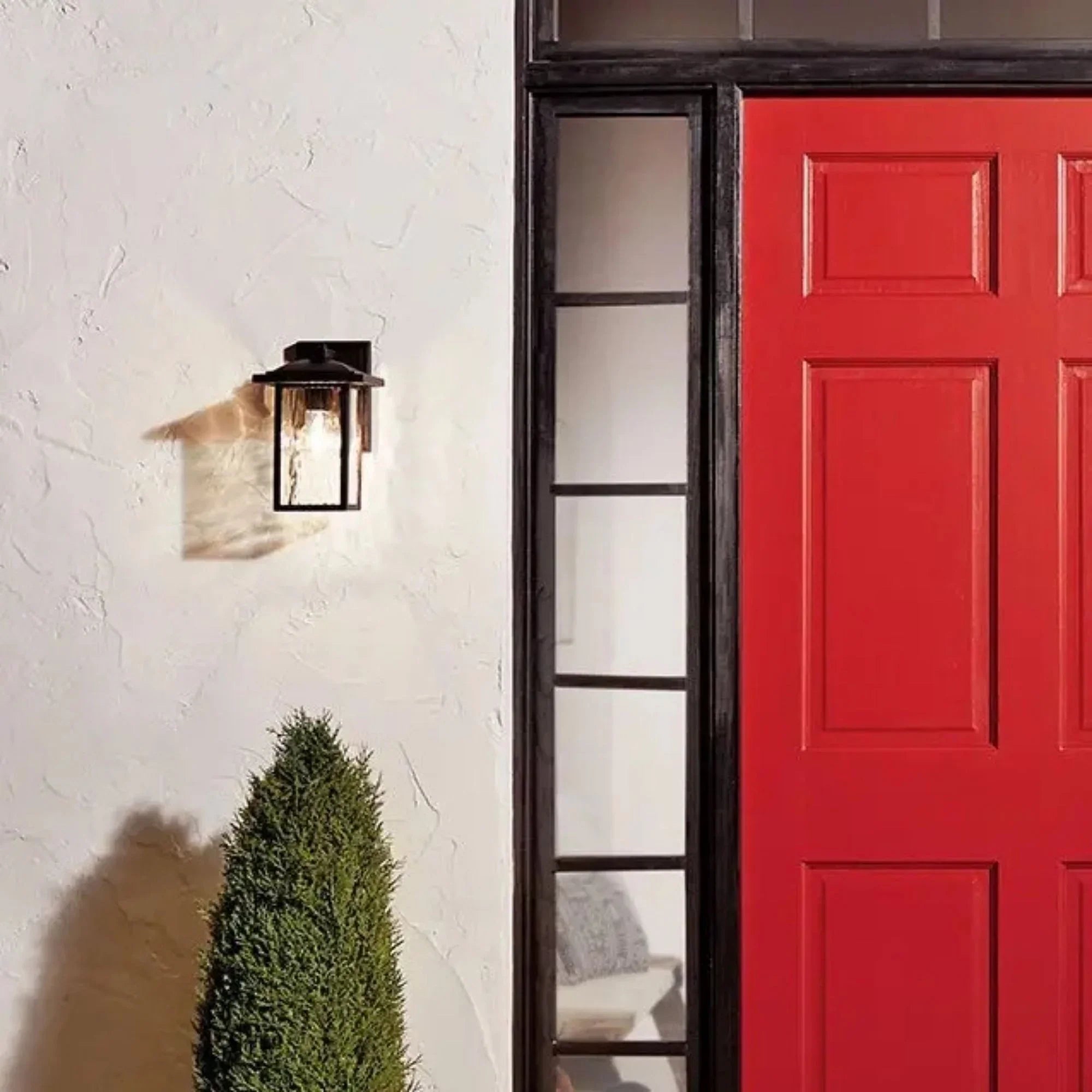 Kichler Capanna 10.25 in. Outdoor Wall Sconce, Textured Black with Clear Water Glass