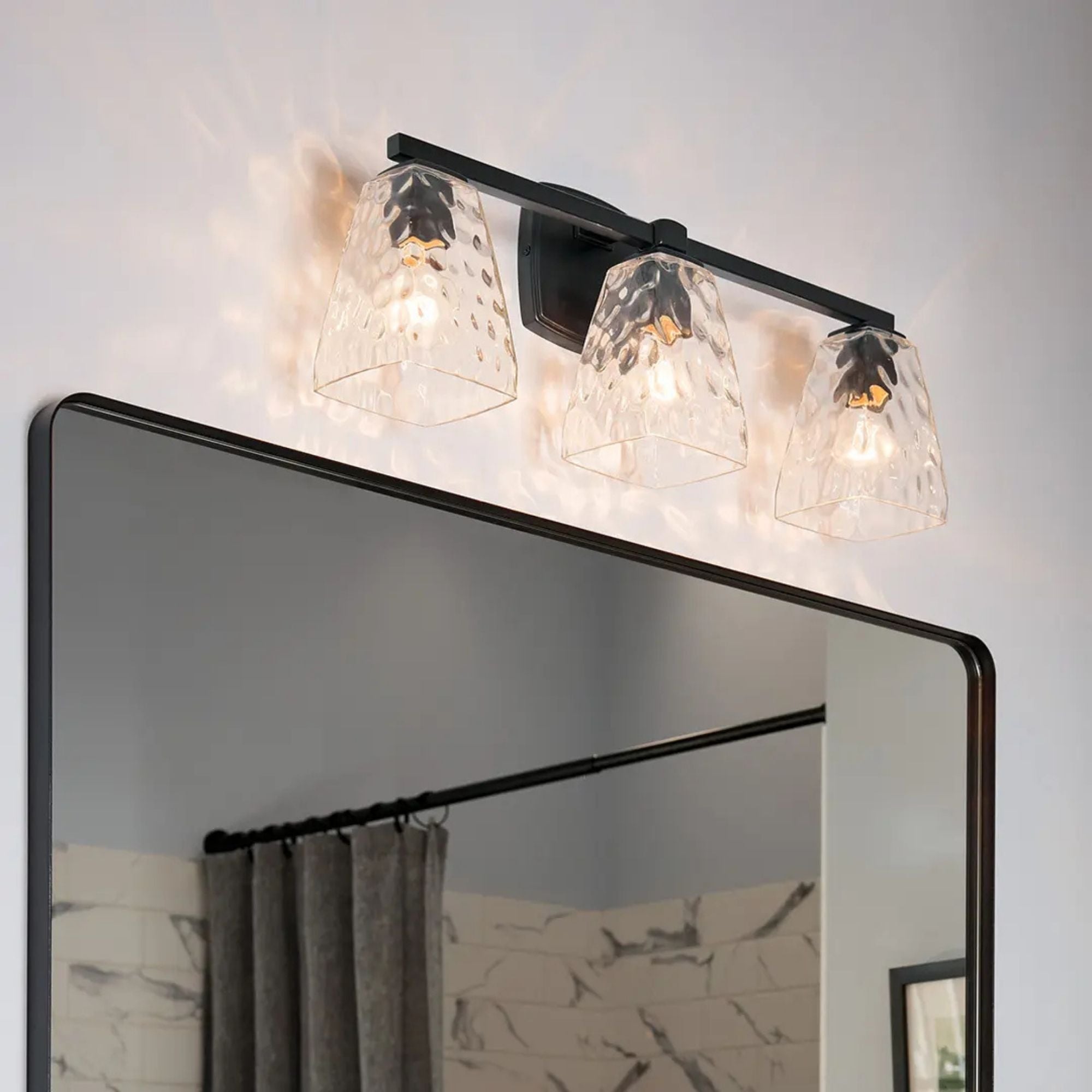 Kichler Marant 23.75 in. 3-Light Vanity Light, Black with Clear Water Glass Tapered Shade