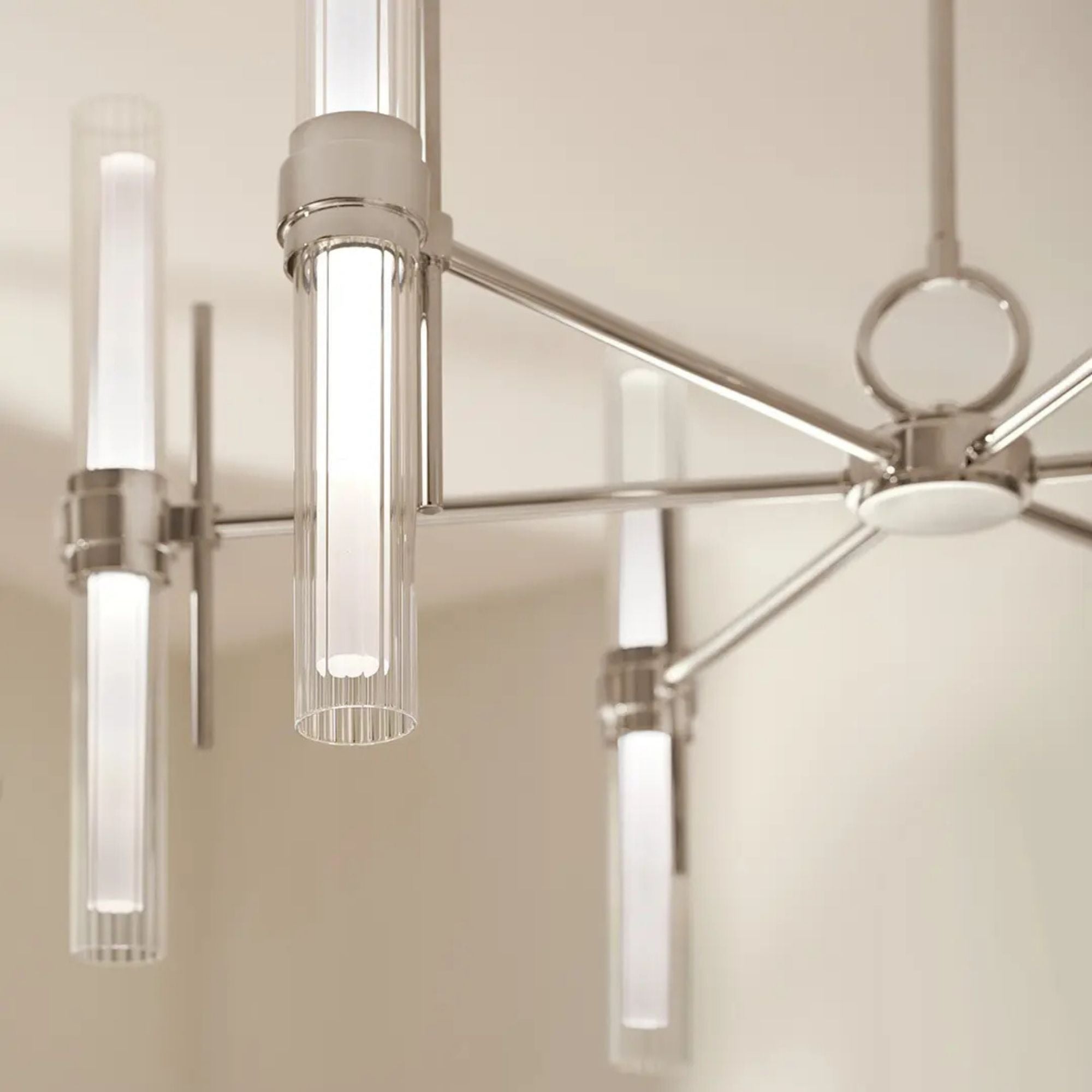 Kichler Riven 33 in. 12-Light Chandelier, Polished Nickel with Clear Fluted Glass Cylinder Shade