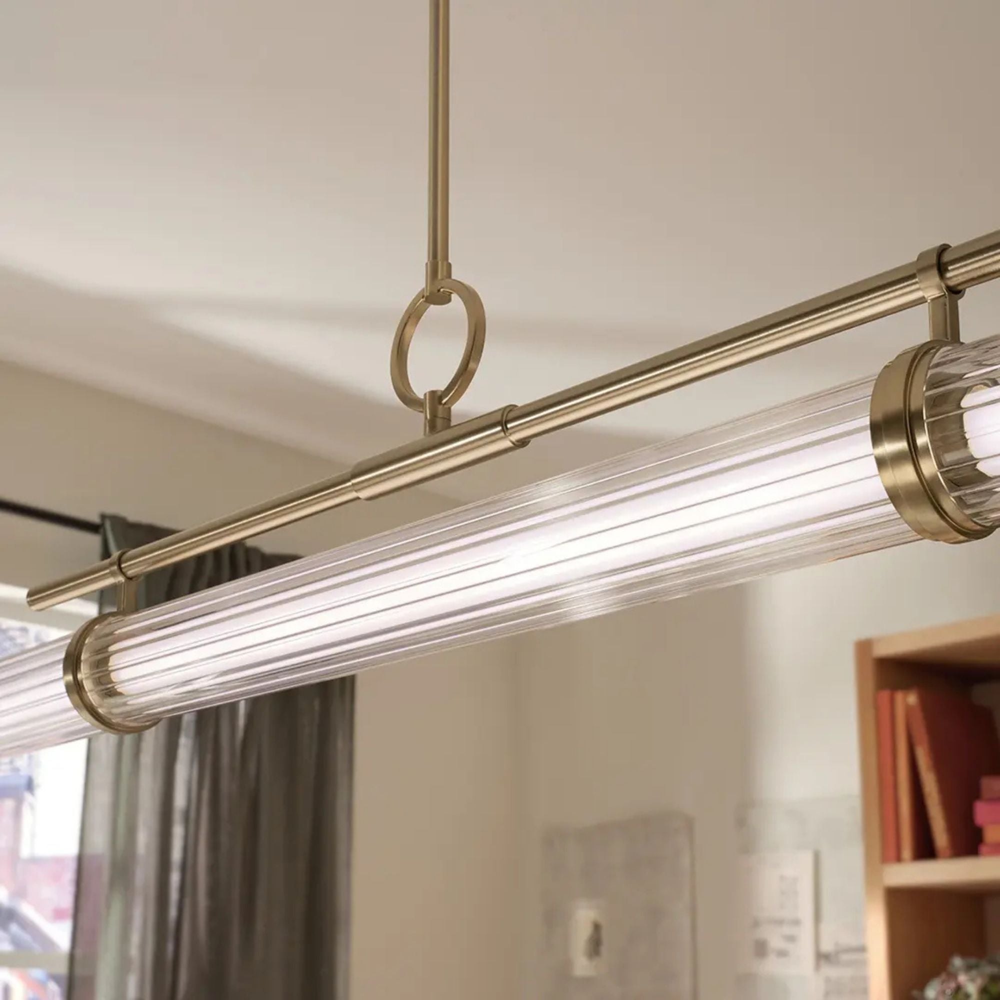 Kichler Riven 48.25 in. Linear Chandelier, Champagne Bronze with Clear Fluted Glass Cylinder Shade