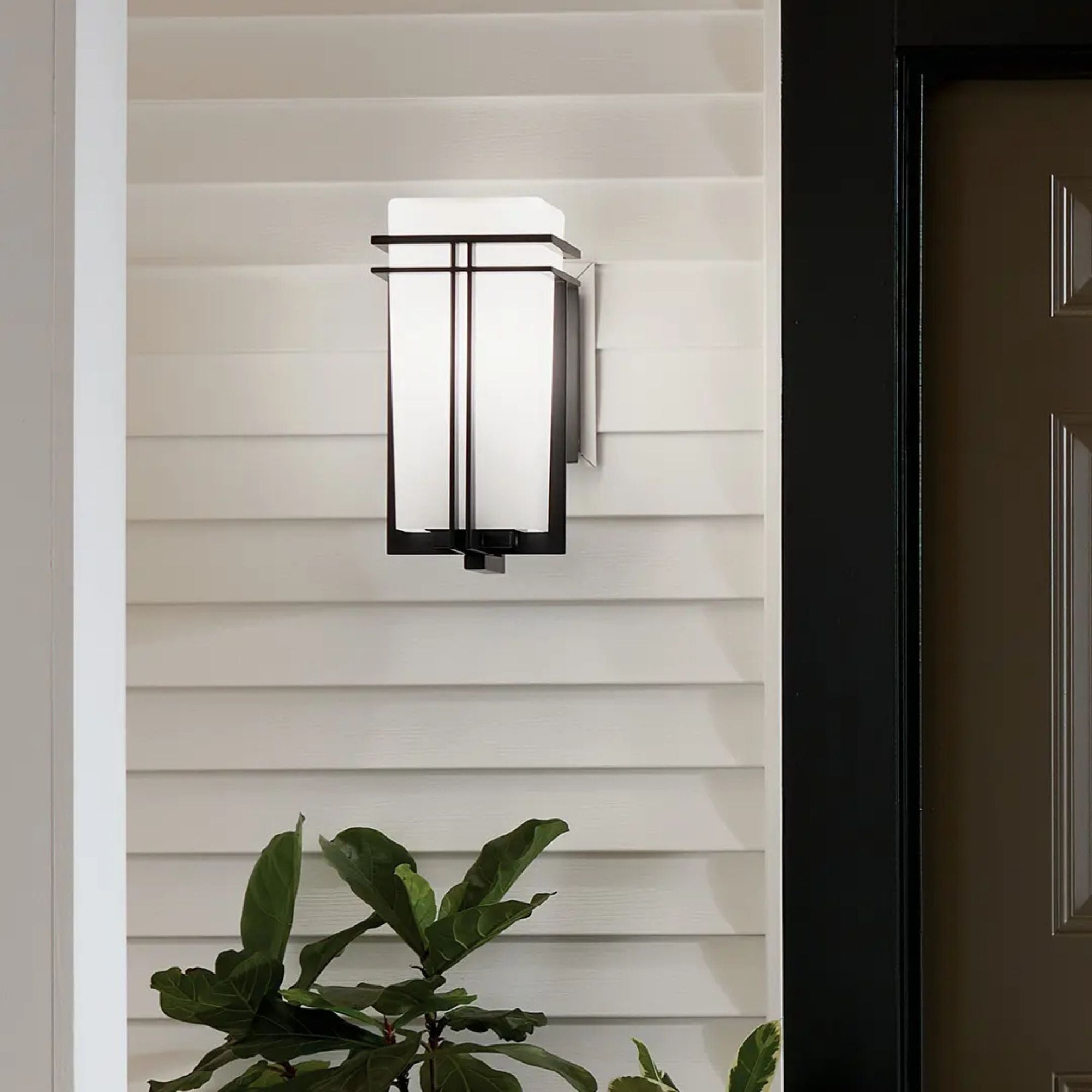 Tremillo 17.25 in. Outdoor Sconce, Black with Clear Glass
