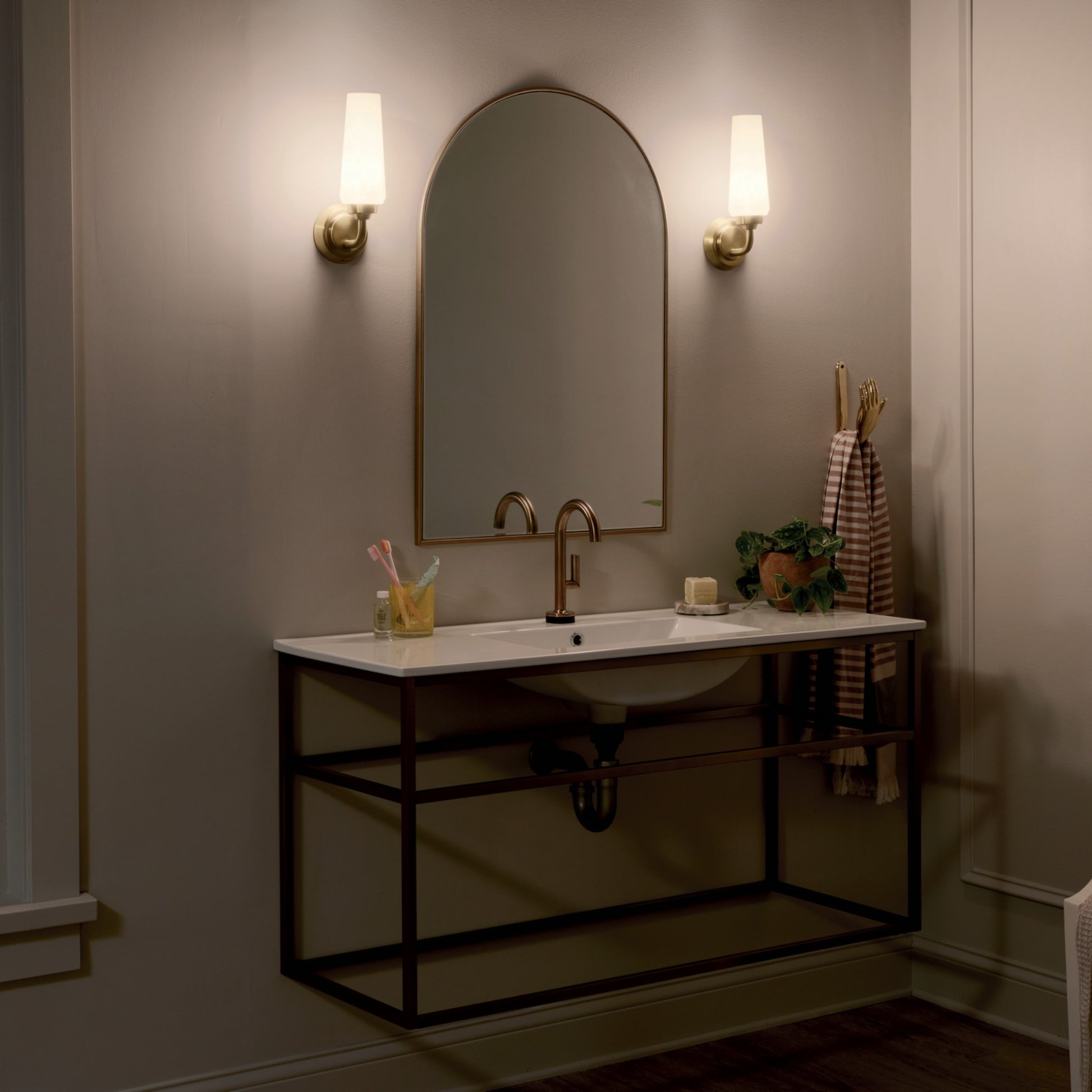 Truby 12" Wall Sconce, Champagne Bronze Finish - Bees Lighting