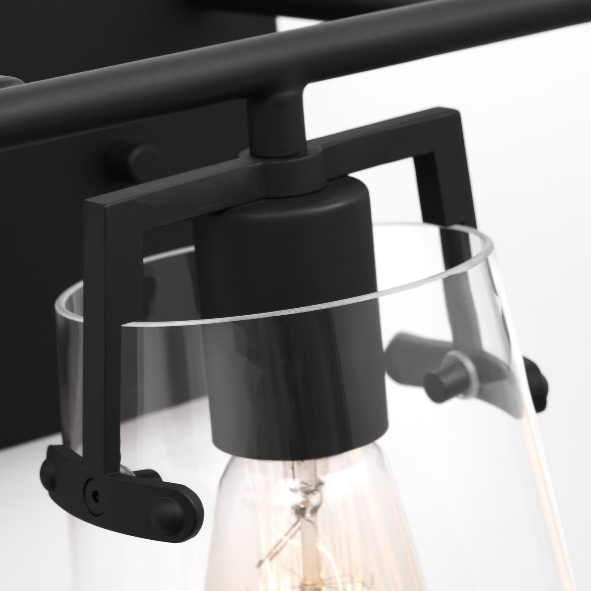 Crofton 24" 3-Light Bathroom Vanity, Midnight Black Finish with Clear Glass - Bees Lighting