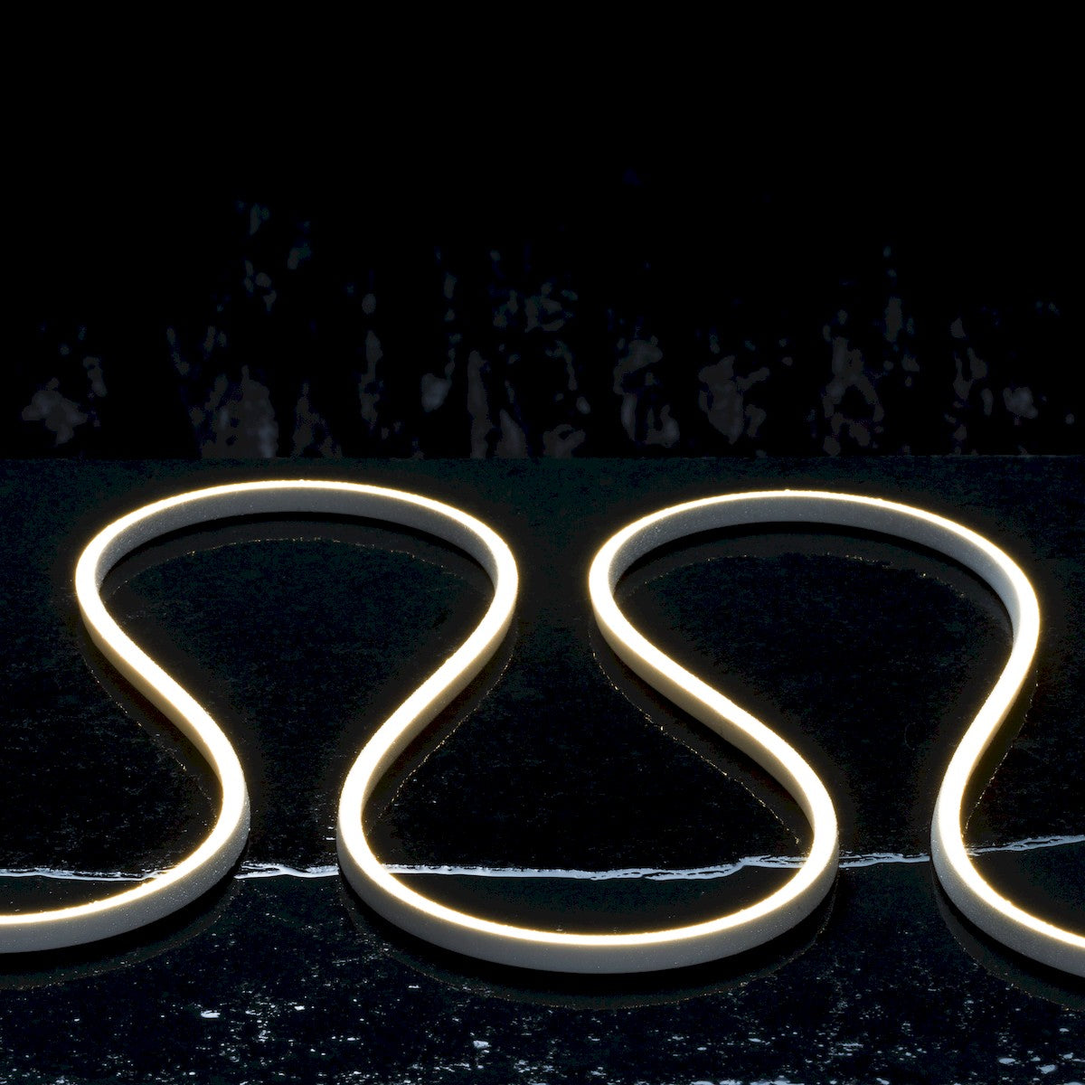 LED side-bend neon strip light with cool-white glow, curved heart-like loop