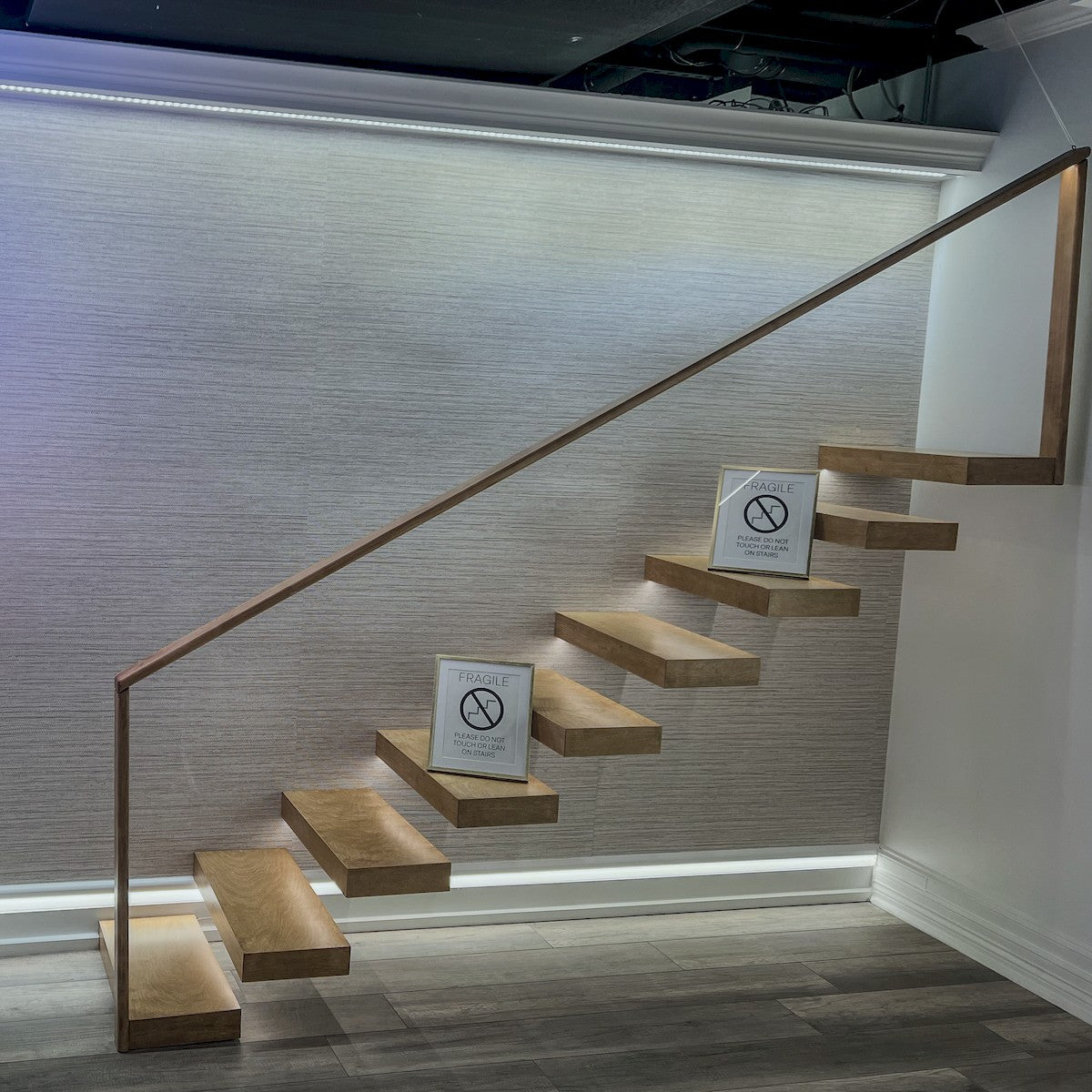 LED side-bend neon strip lighting along stair area, cool-white glowing outline