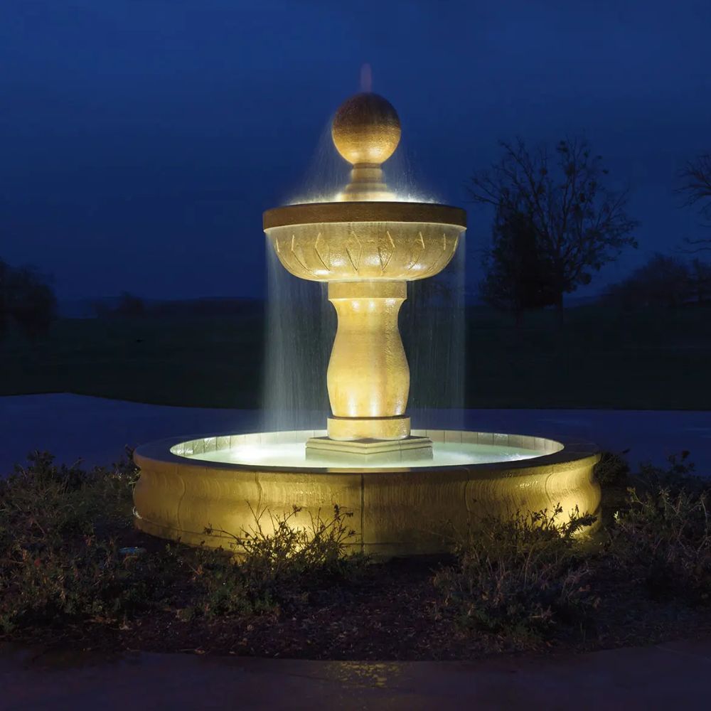 Glowing stainless steel LED fountain accent light with round base and clear lens